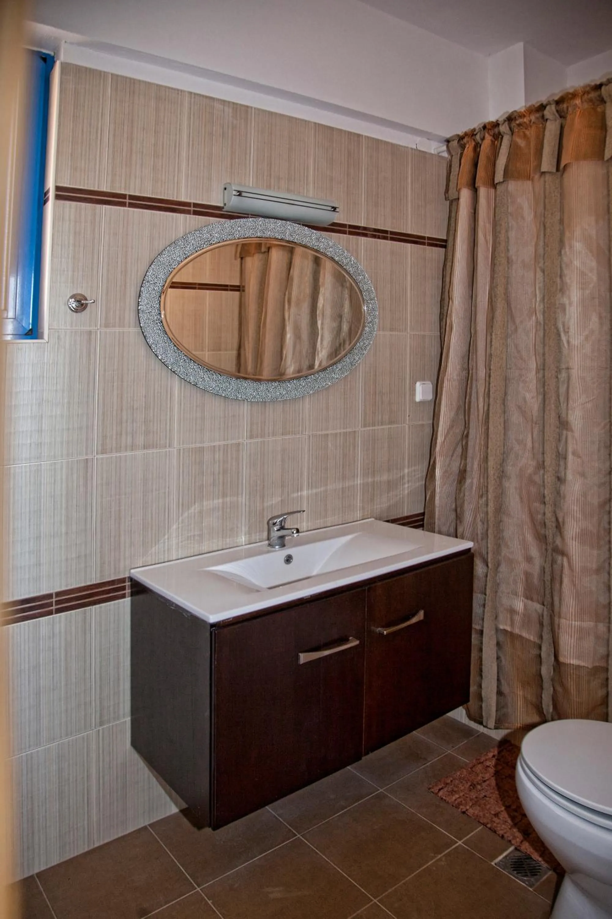 Toilet in Gold Apartments