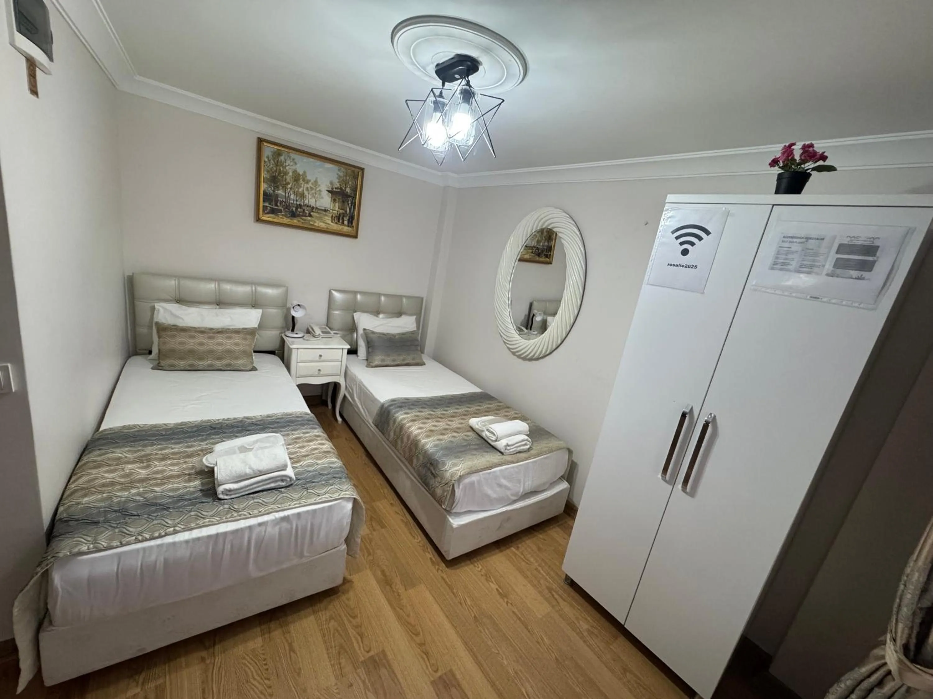 Bed in Rosalie Palace Hotel