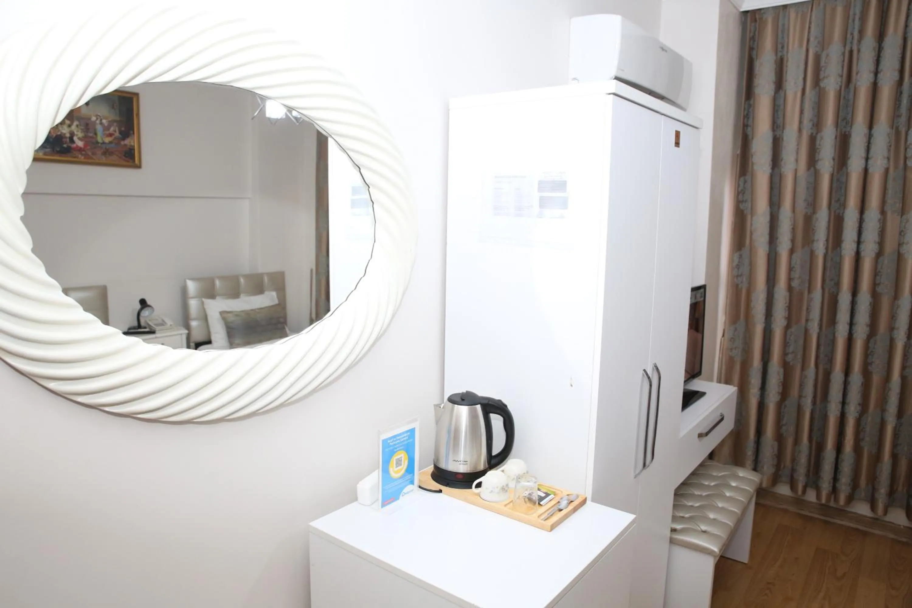 wardrobe in Rosalie Palace Hotel