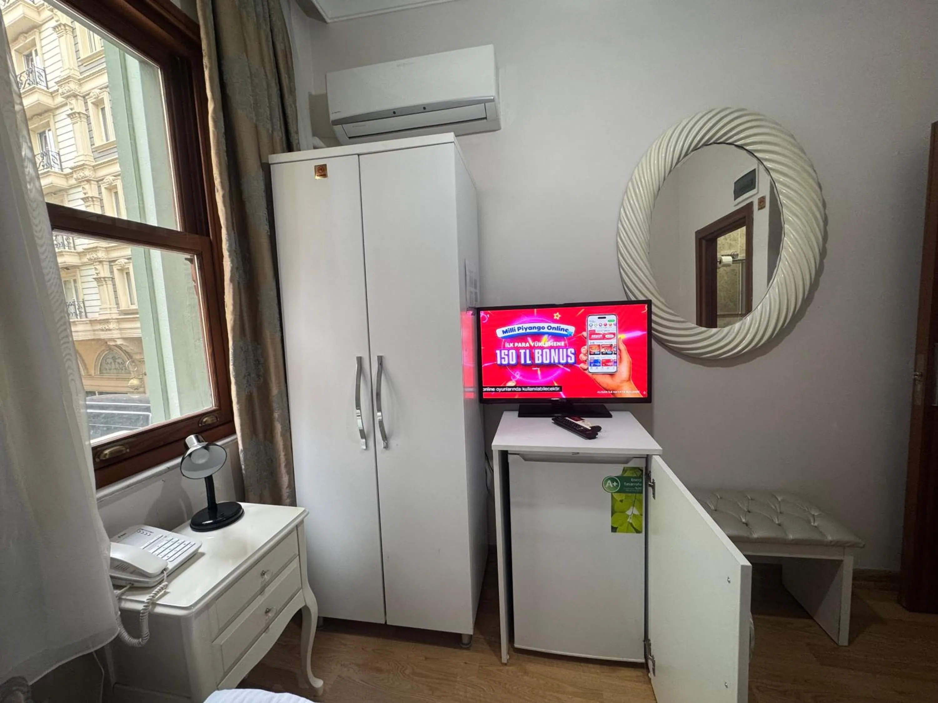 Bed in Rosalie Palace Hotel