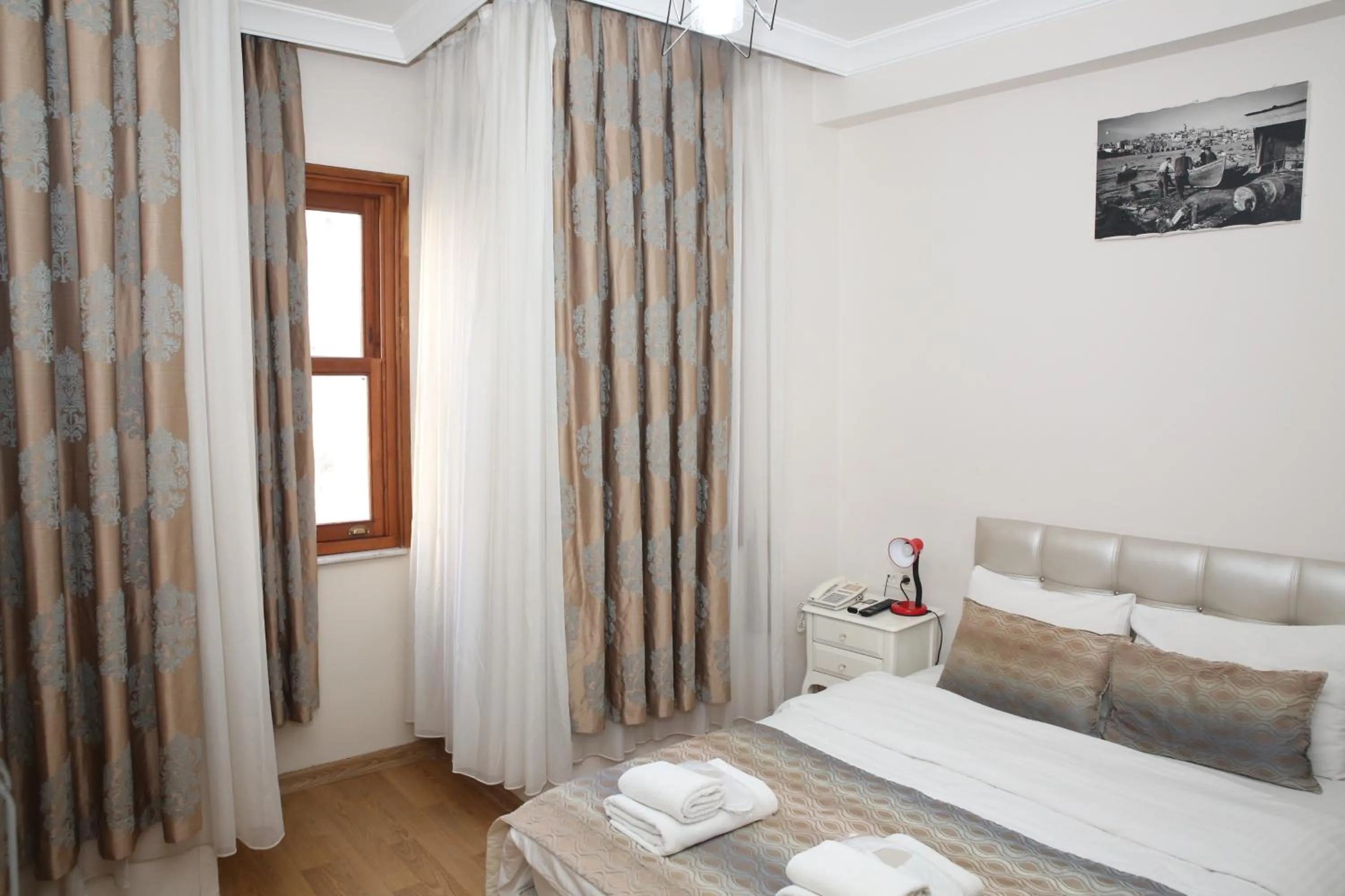 Bed in Rosalie Palace Hotel