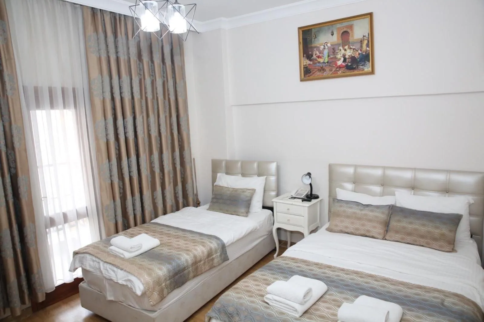 Bed in Rosalie Palace Hotel