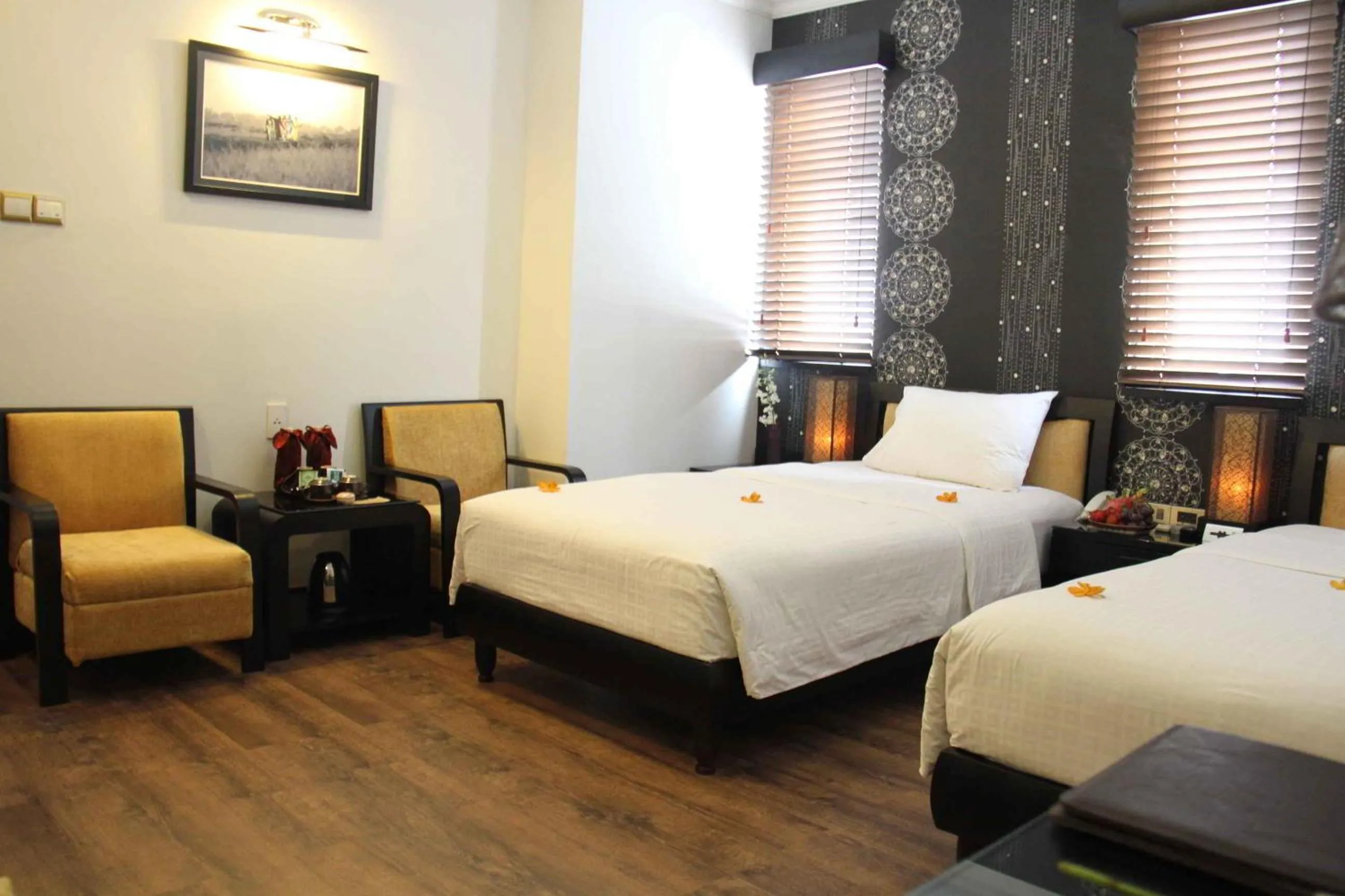 Seating area, Bed in Orchid Hotel