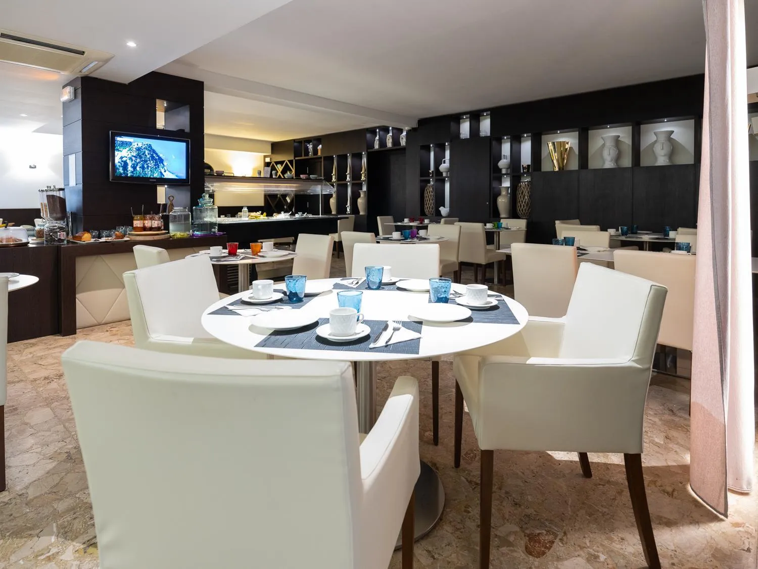 Living room in Hotel Revellata & Spa