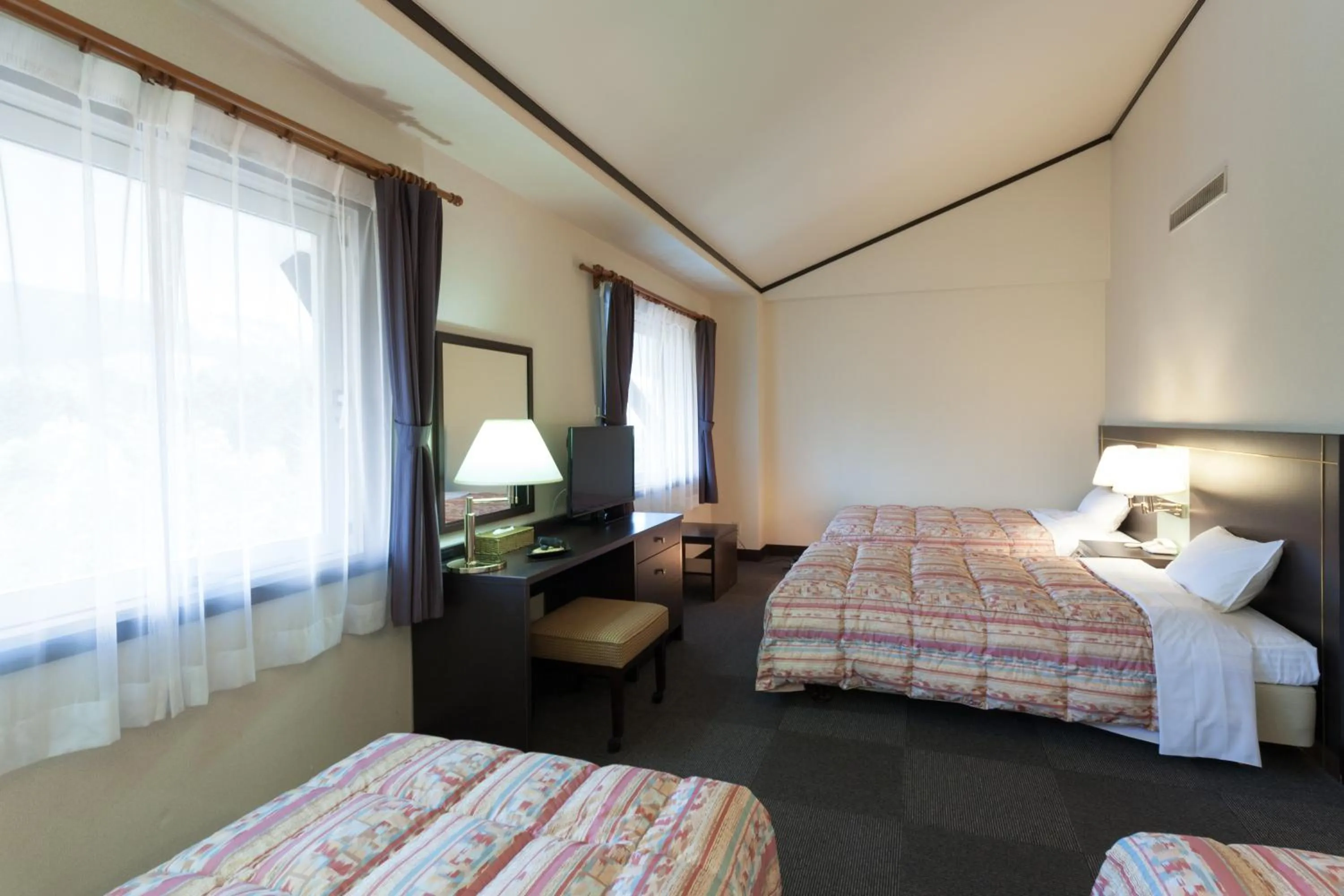 Photo of the whole room, Bed in Forest Hotel Rochefort