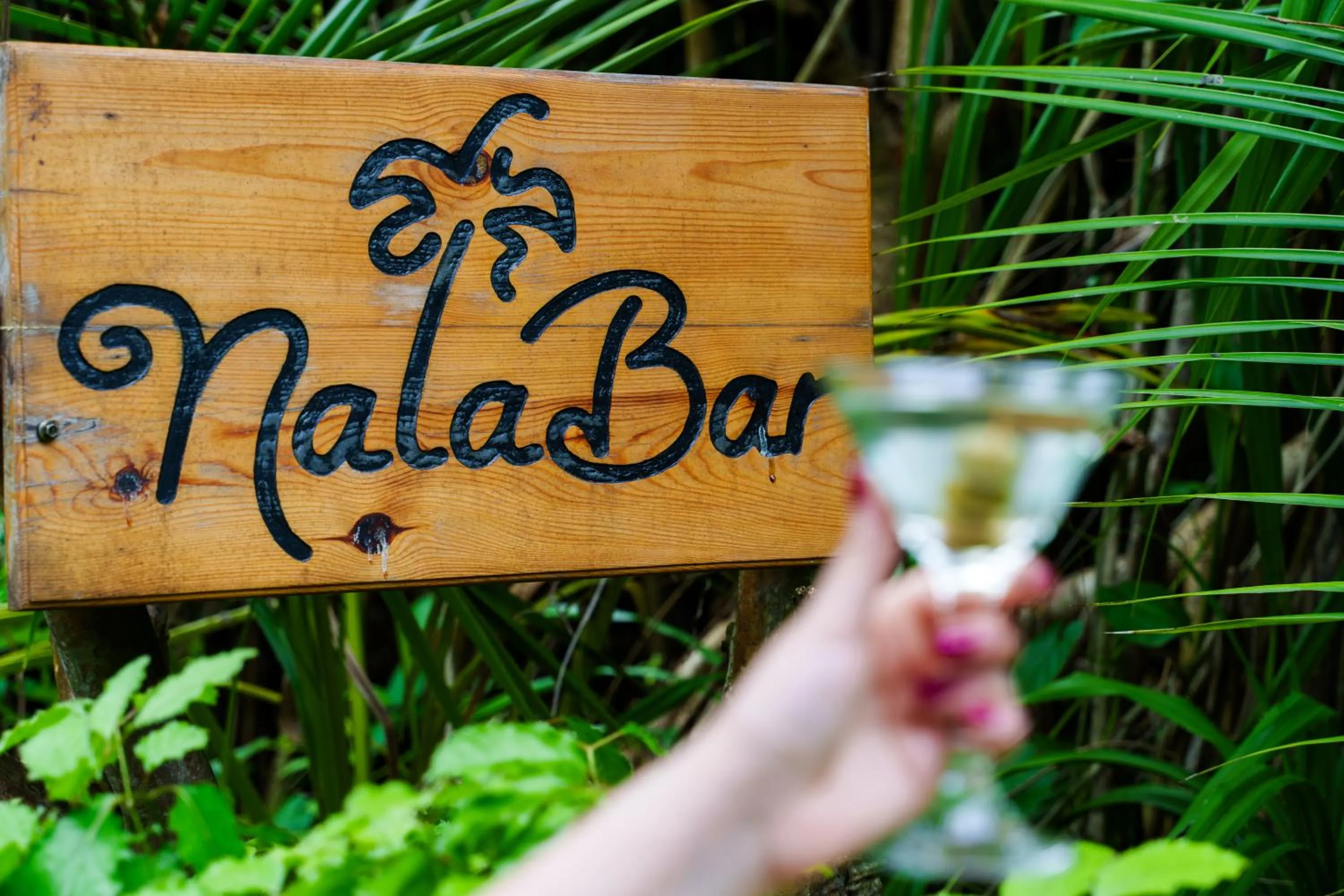 Lounge or bar in Reethi Faru Resort