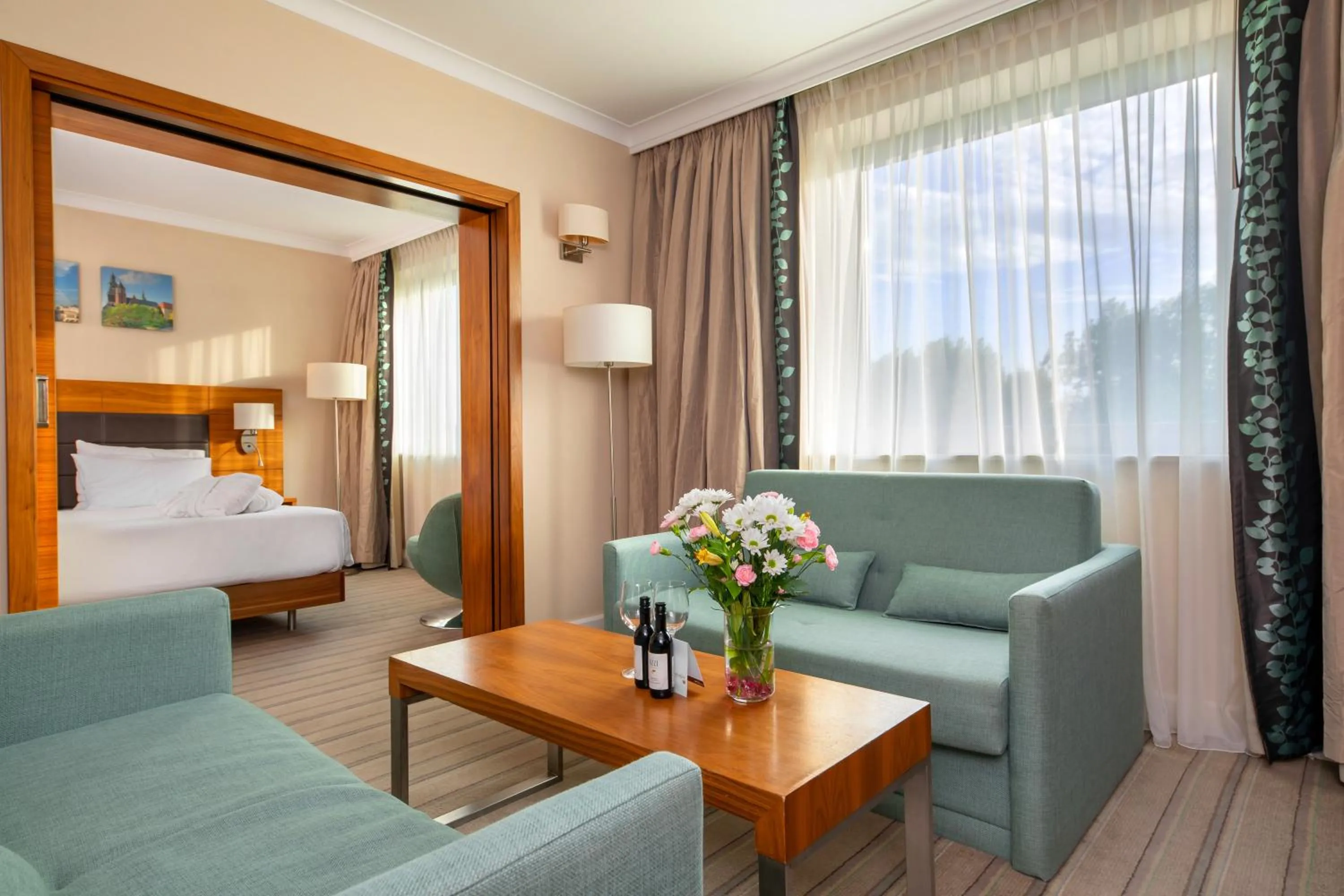 Seating area, Bed in Hilton Garden Inn Krakow