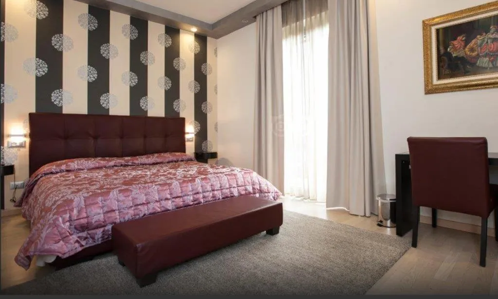 Bed in La Grotta Hotel