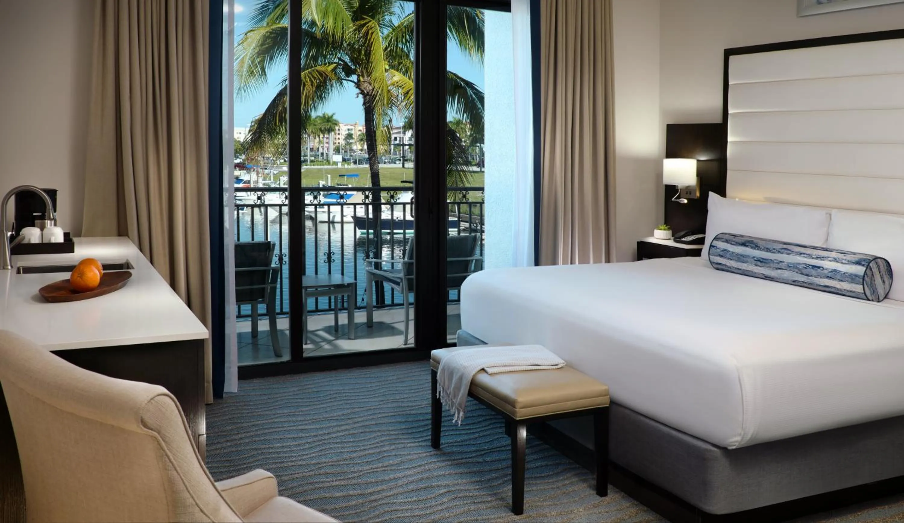 Bed in Naples Bay Resort and Marina