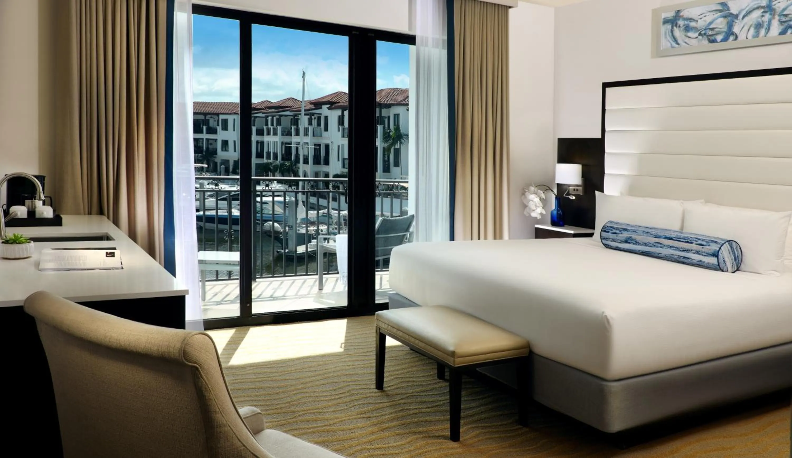 Bed in Naples Bay Resort and Marina