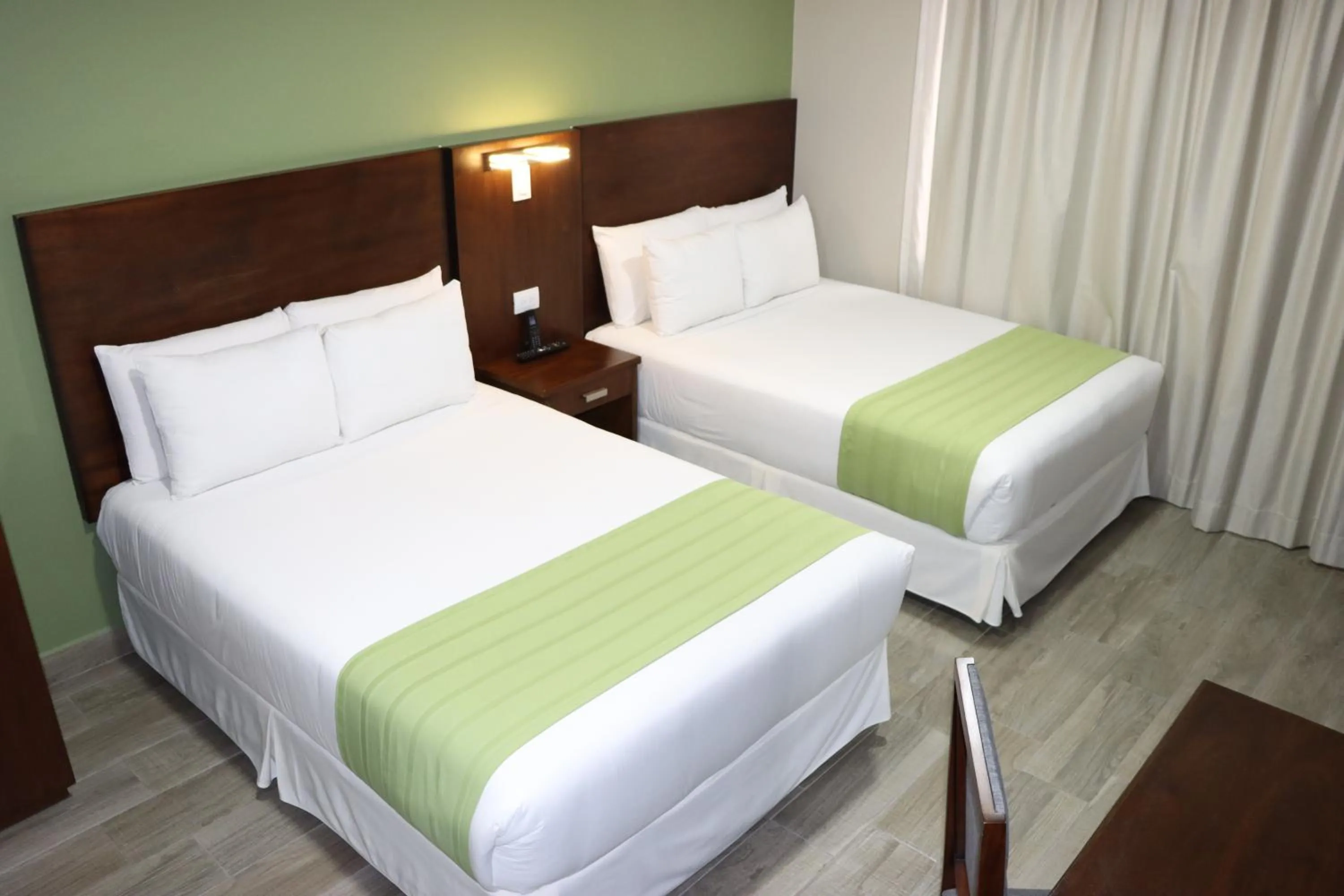 Bed in Hotel San Agustin Plaza