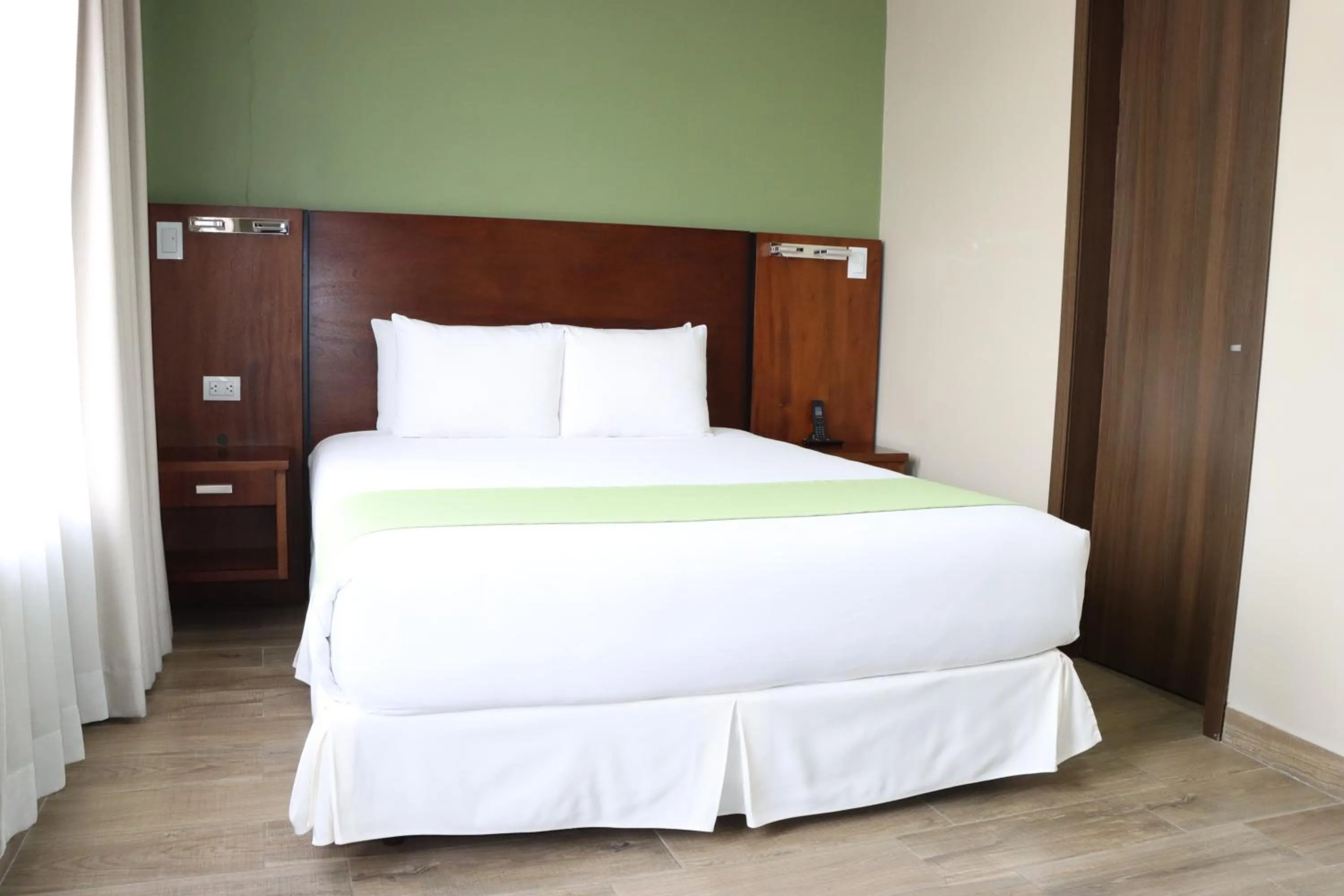 Bed in Hotel San Agustin Plaza