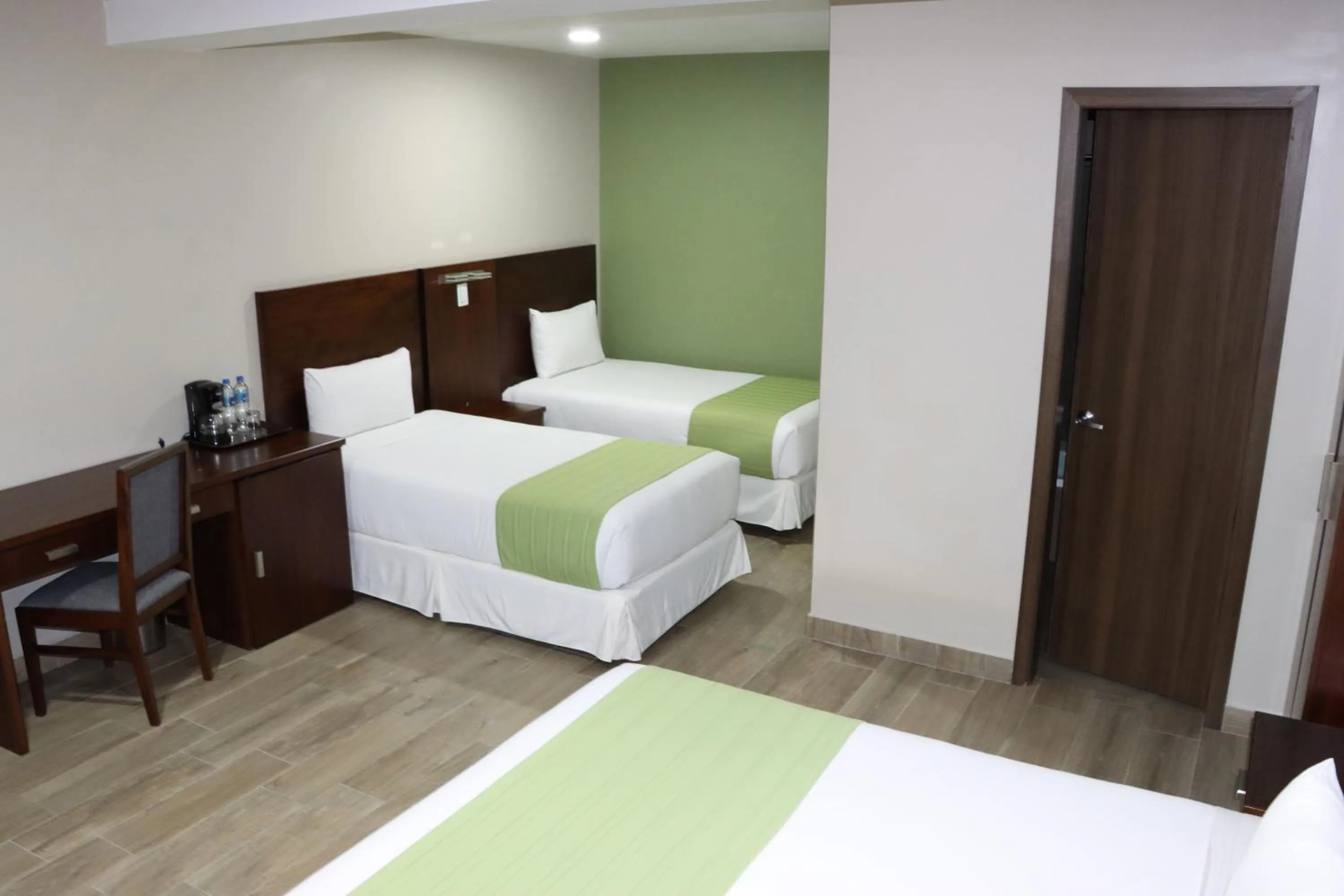 Bed in Hotel San Agustin Plaza