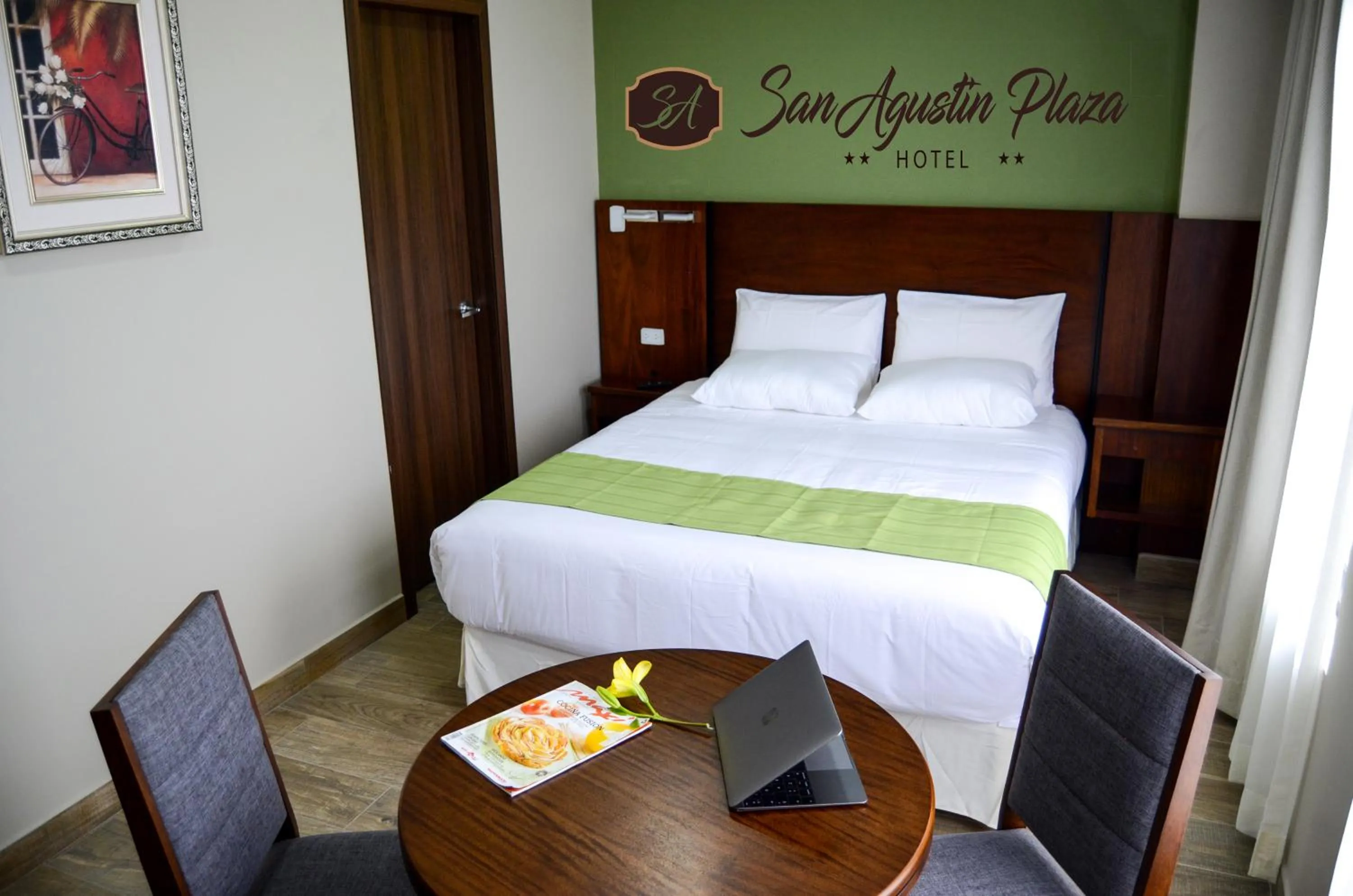 Bed in Hotel San Agustin Plaza