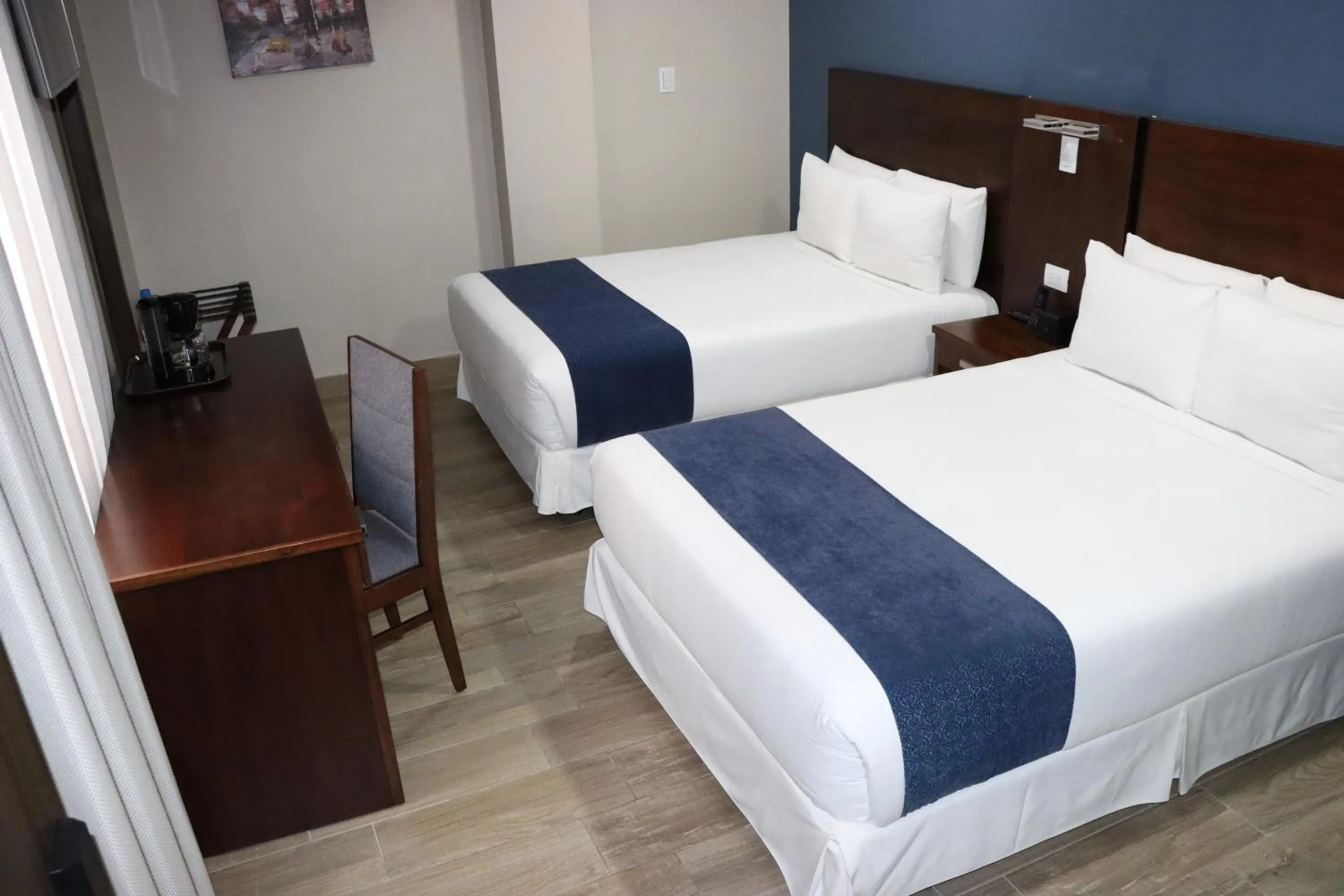 Bed in Hotel San Agustin Plaza