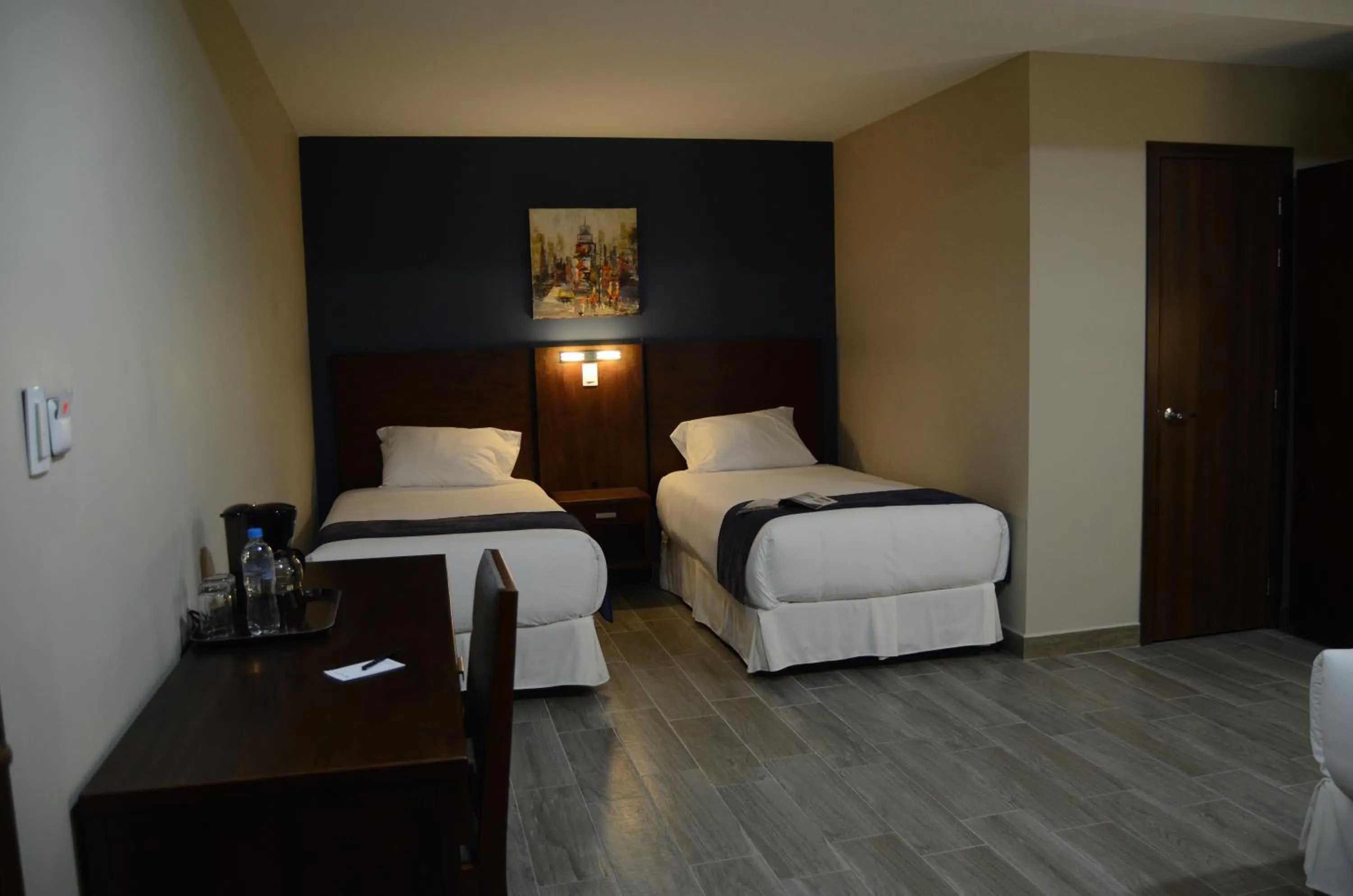Bed in Hotel San Agustin Plaza