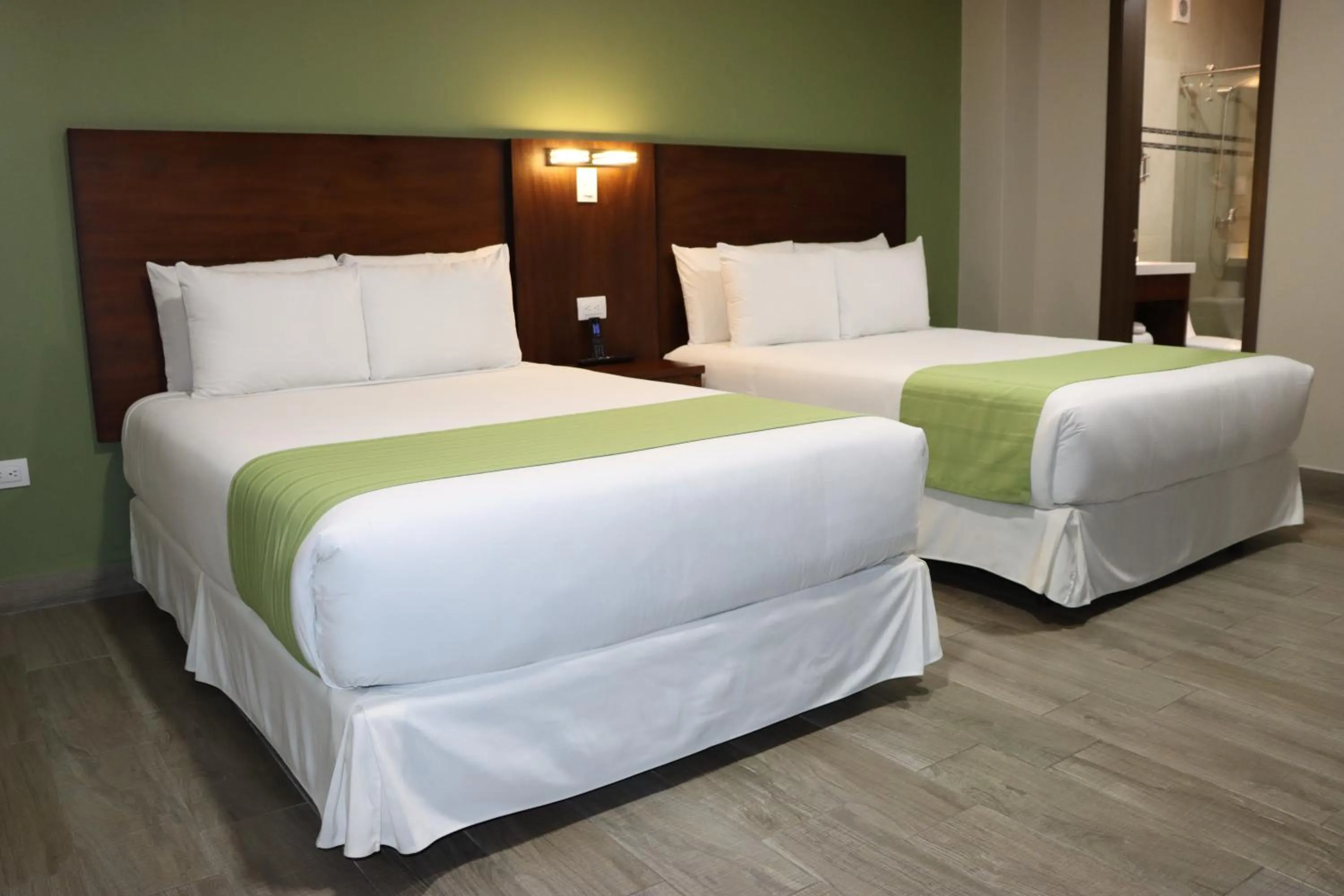 Bed in Hotel San Agustin Plaza