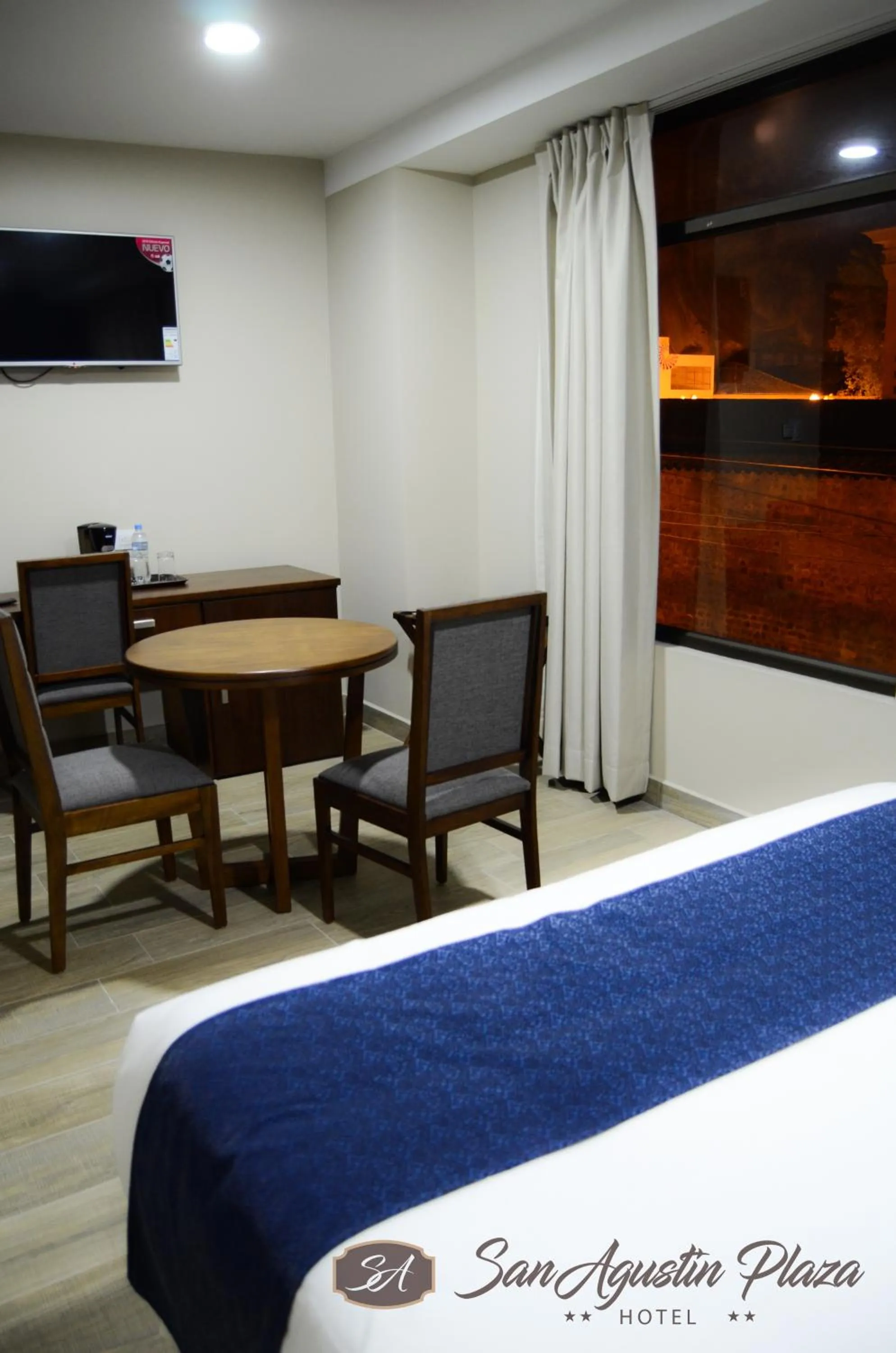 Bed in Hotel San Agustin Plaza