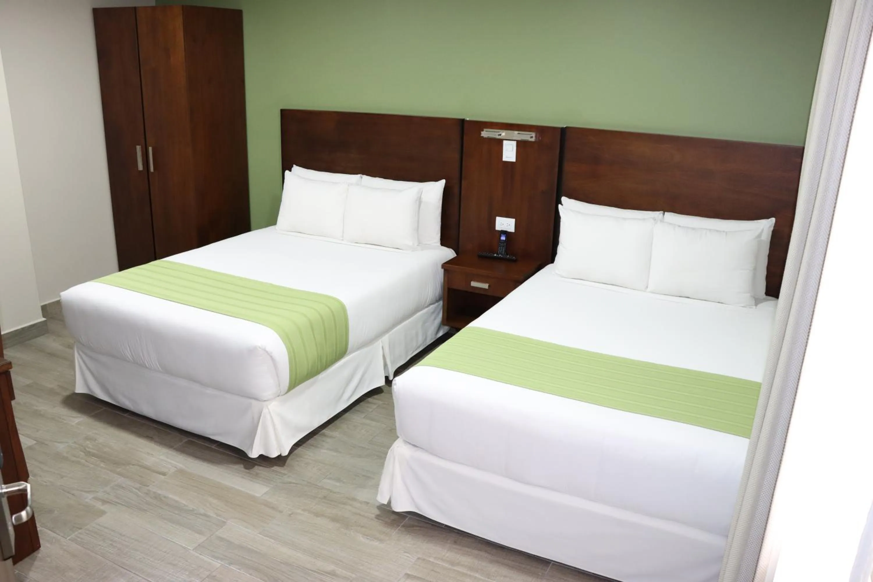 Bed in Hotel San Agustin Plaza