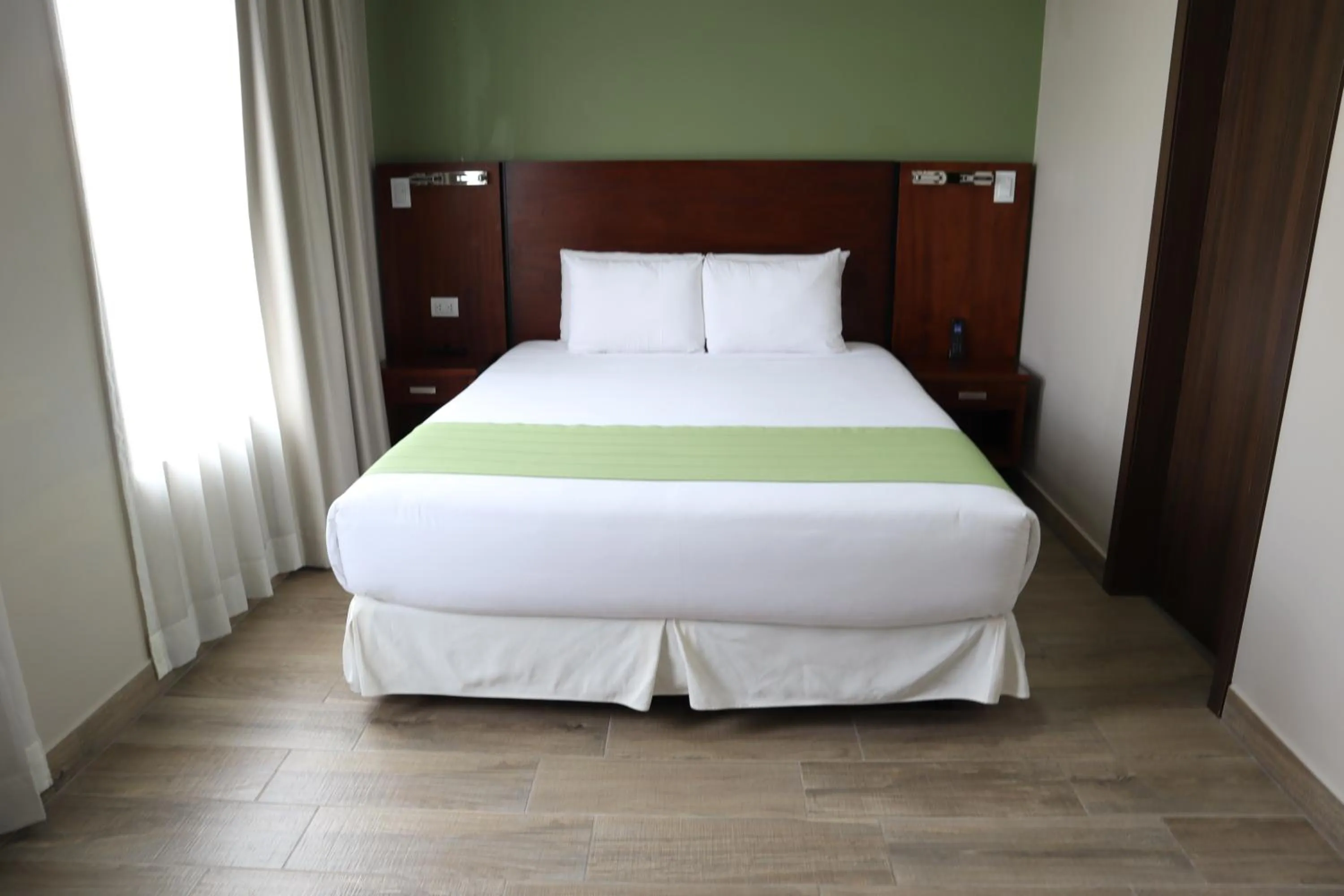 Bed in Hotel San Agustin Plaza
