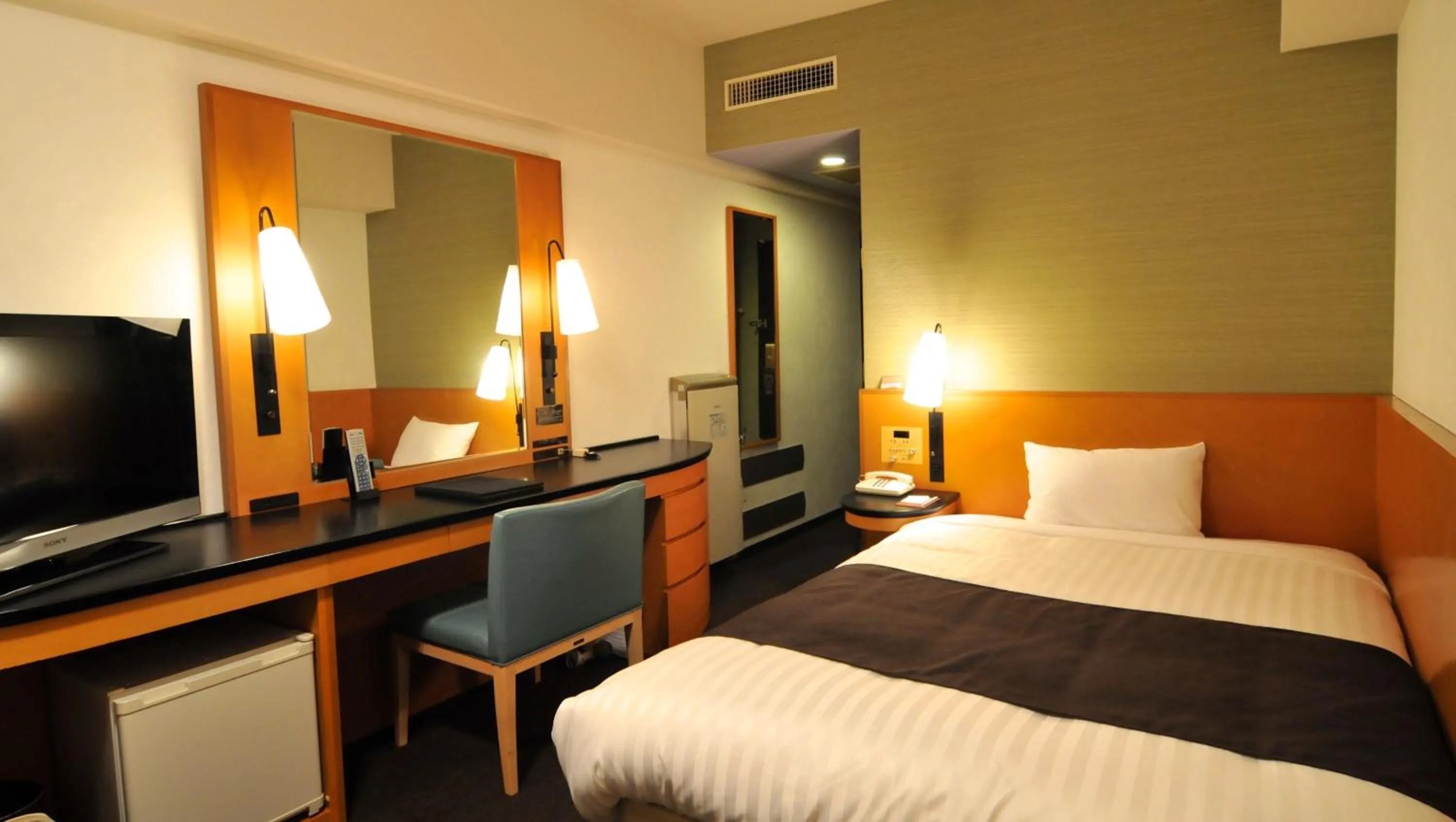 Bed in Hotel Listel Shinjuku