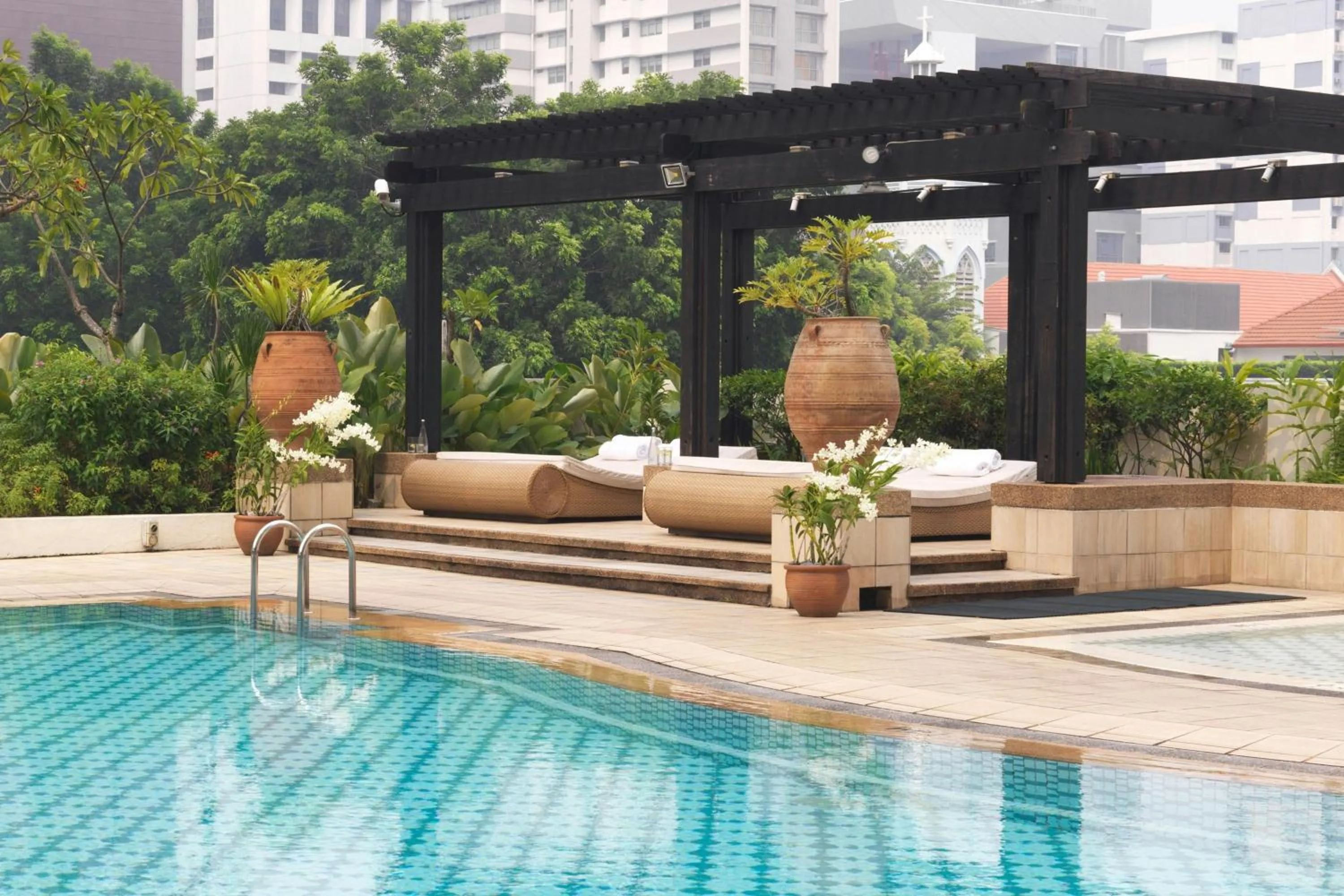 Swimming pool in Frasers House, a Luxury Collection Hotel, Singapore