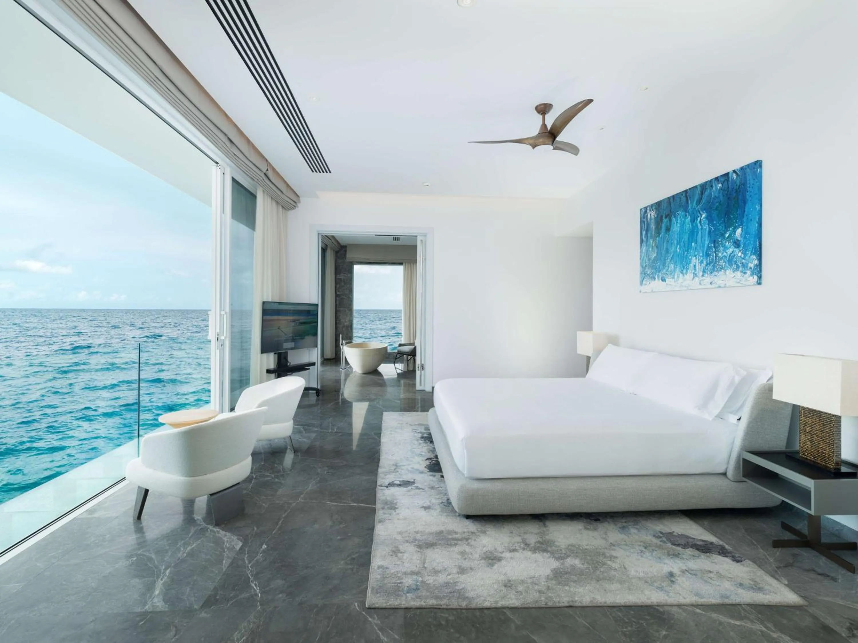 Living room, Bed in Conrad Maldives Rangali Island