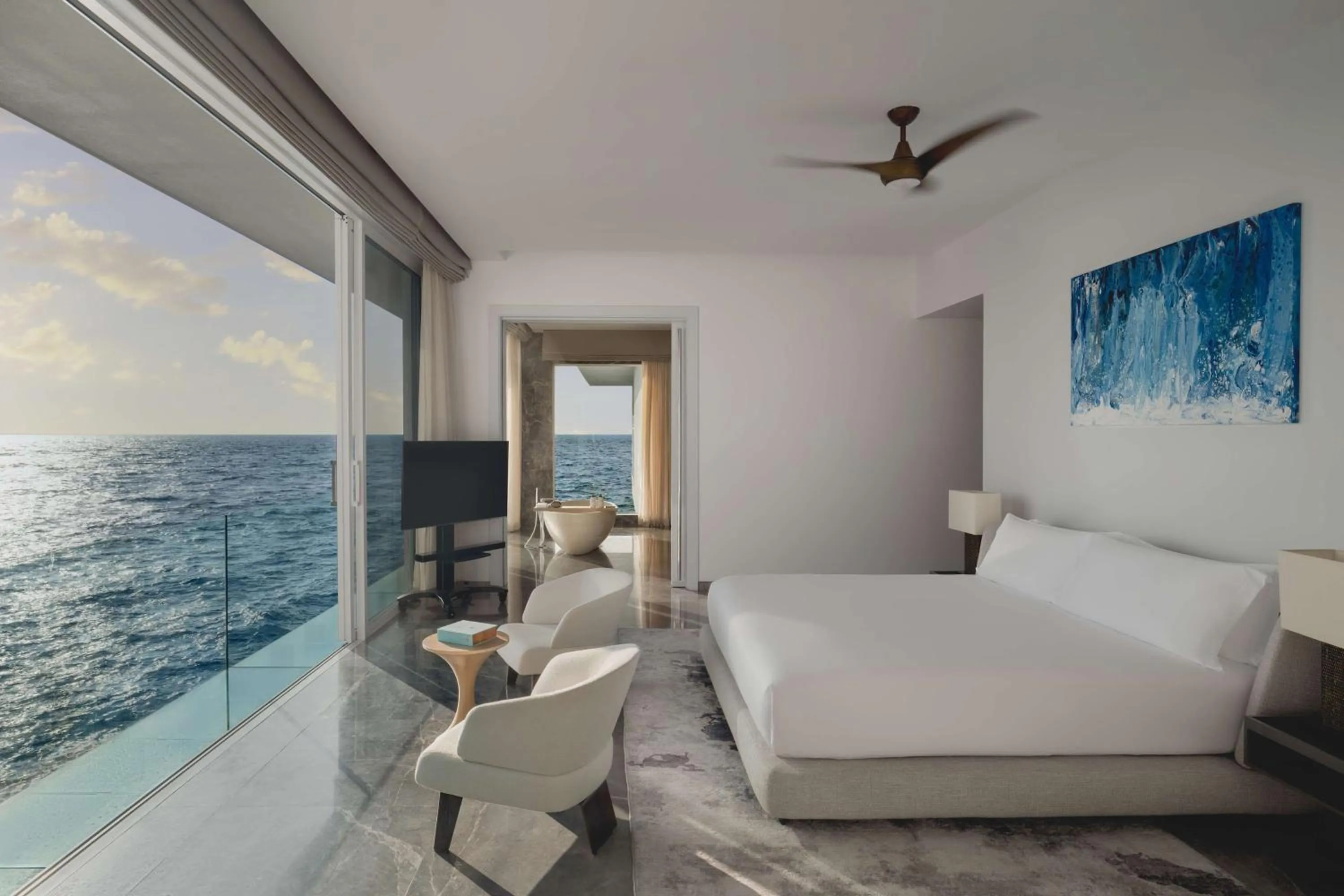 Bed in Conrad Maldives Rangali Island