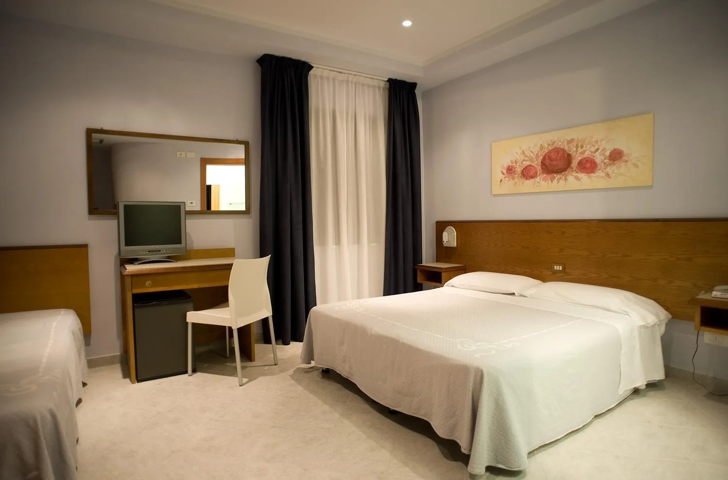 Bed in Hotel Sirio
