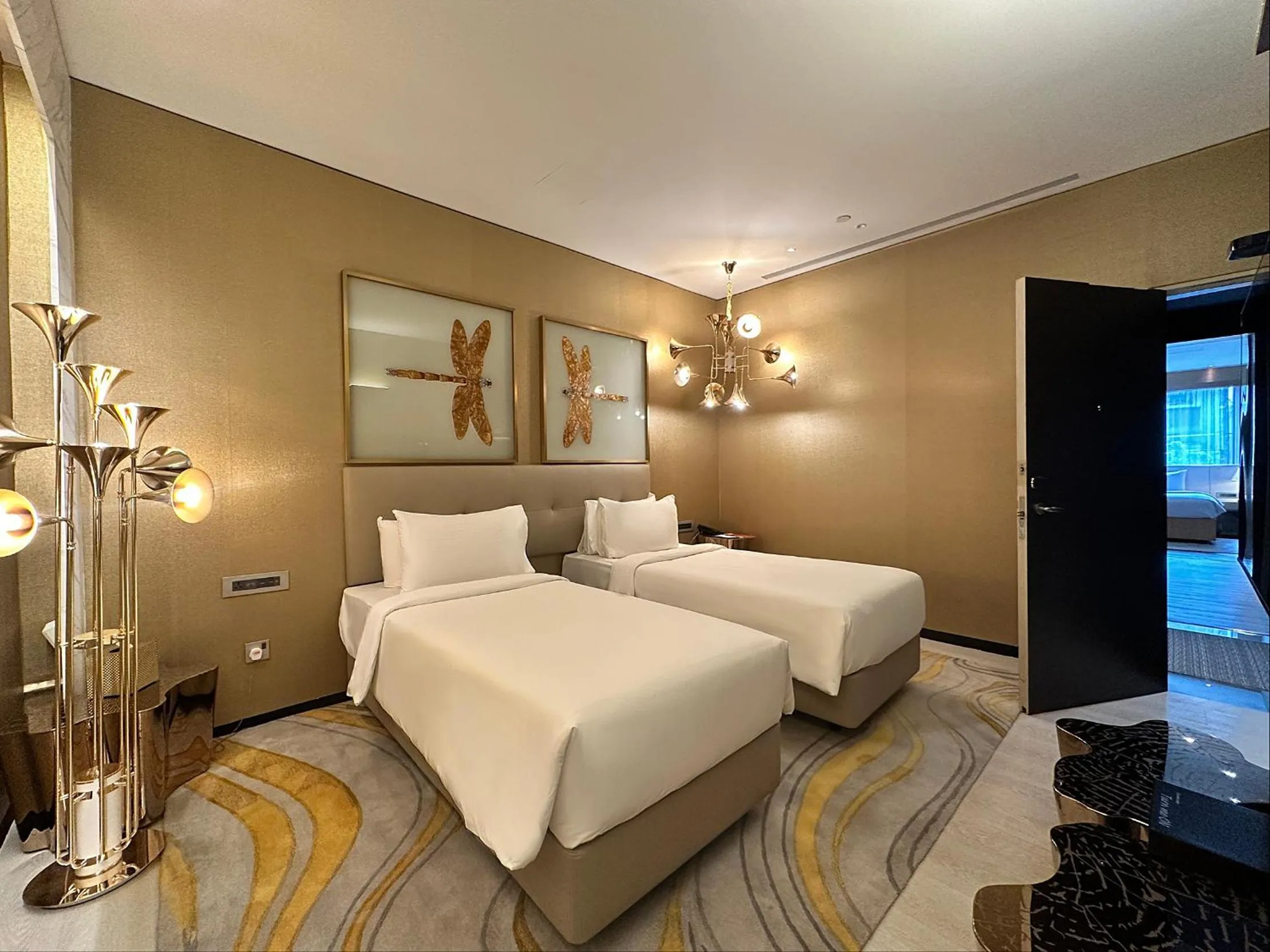 Bed in Naumi Hotel Singapore