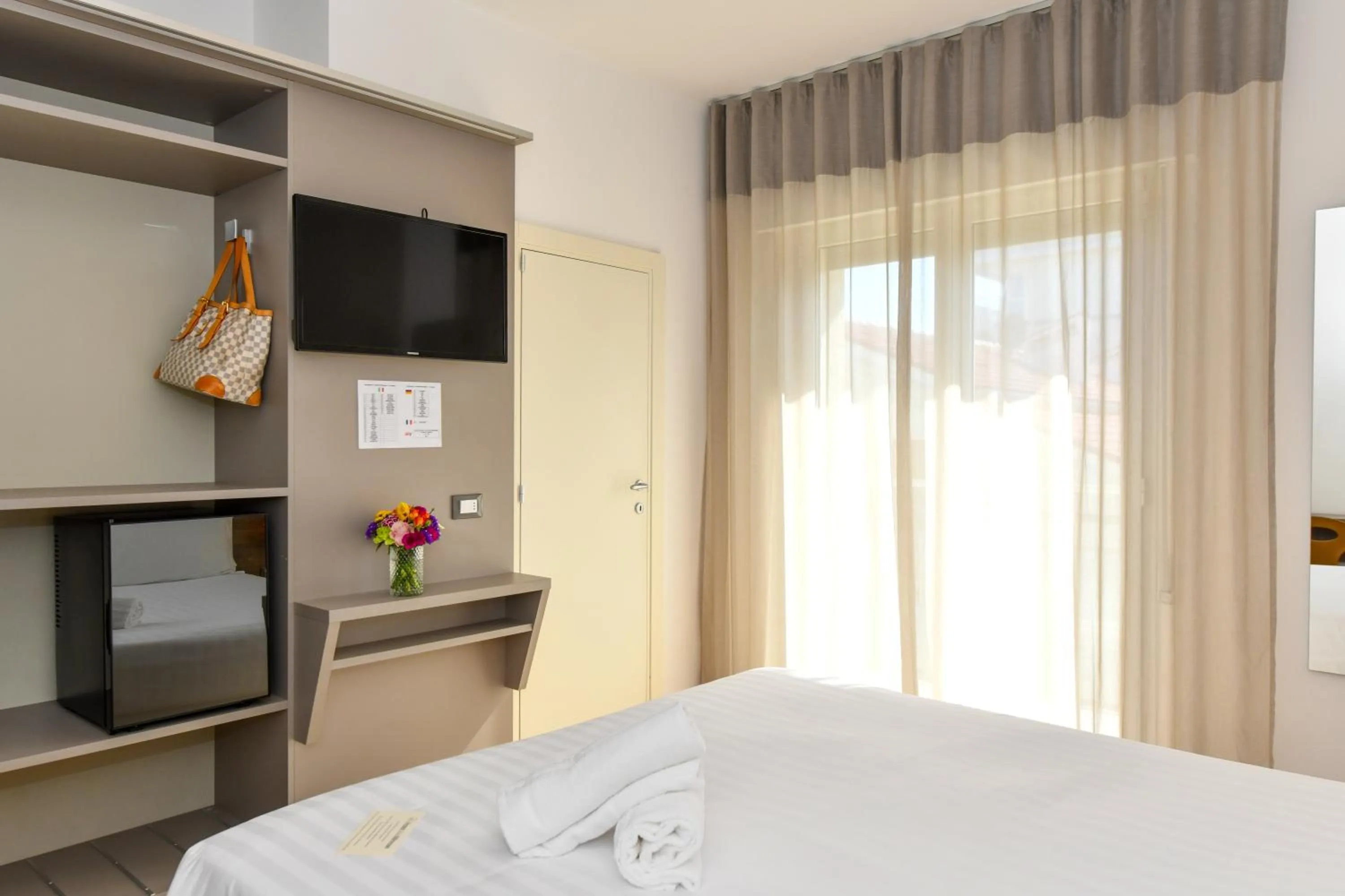 Bed in Hotel Delle Mimose