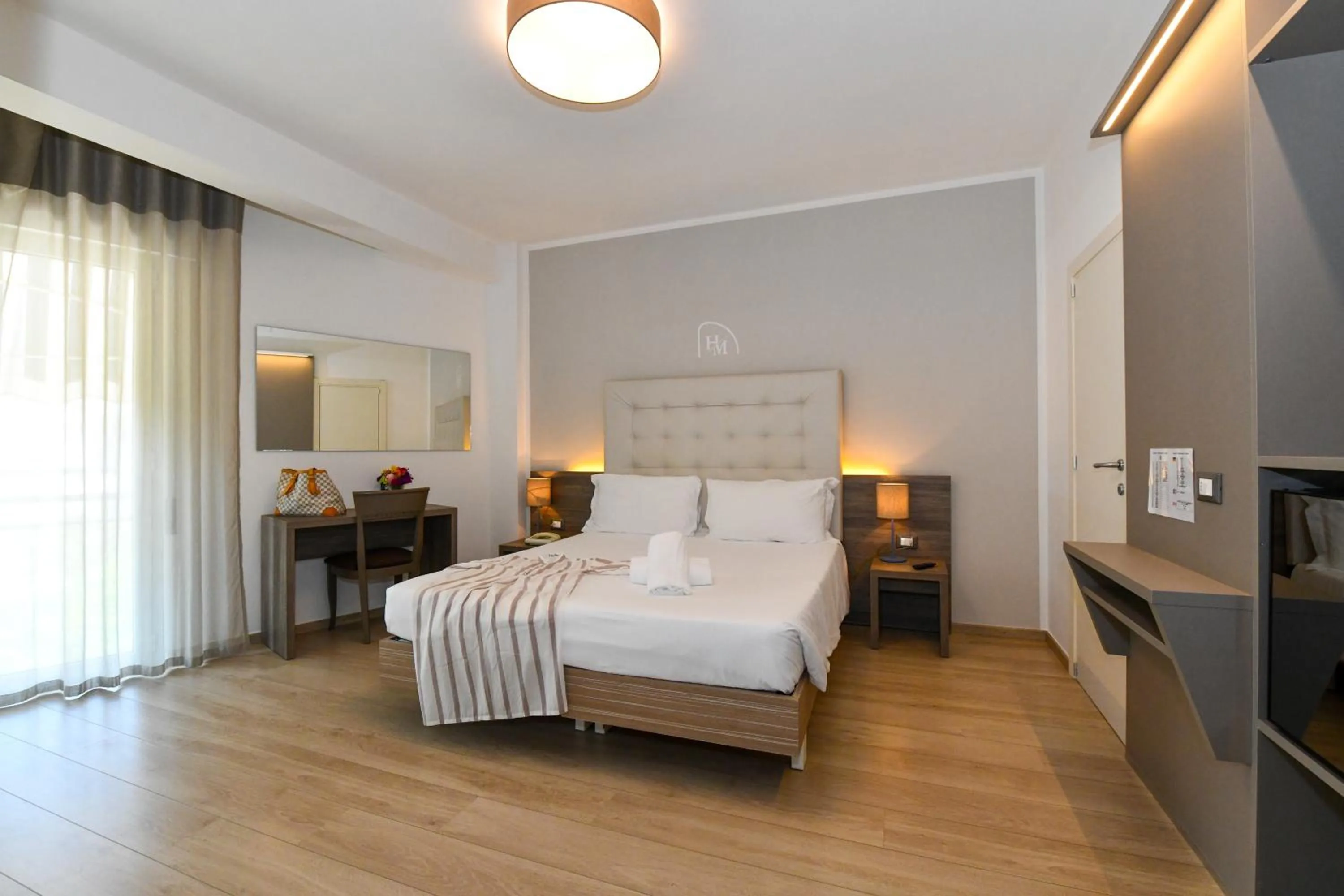 Bed in Hotel Delle Mimose