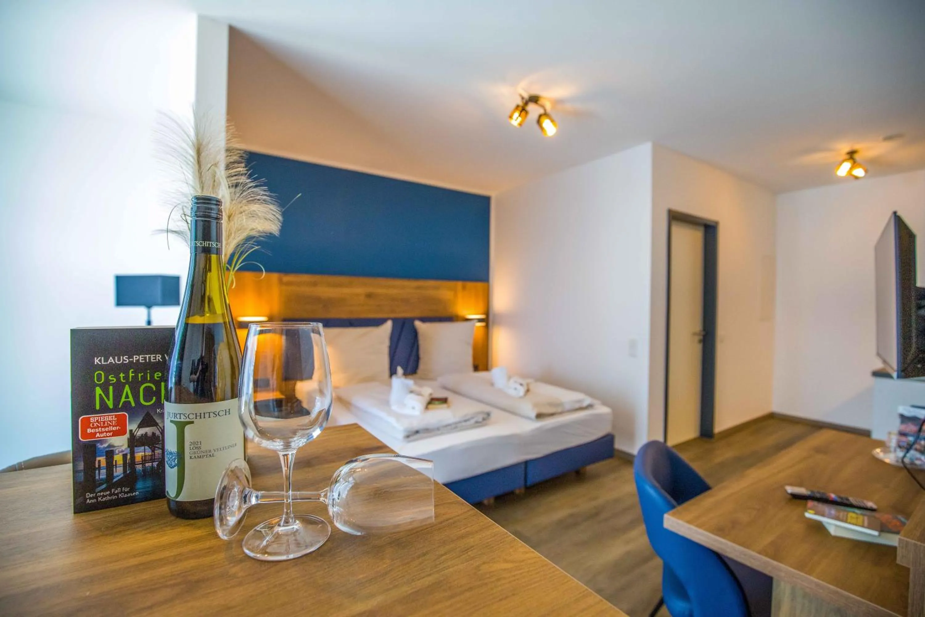 Living room, Bed in Stadthotel-Garni Smutje