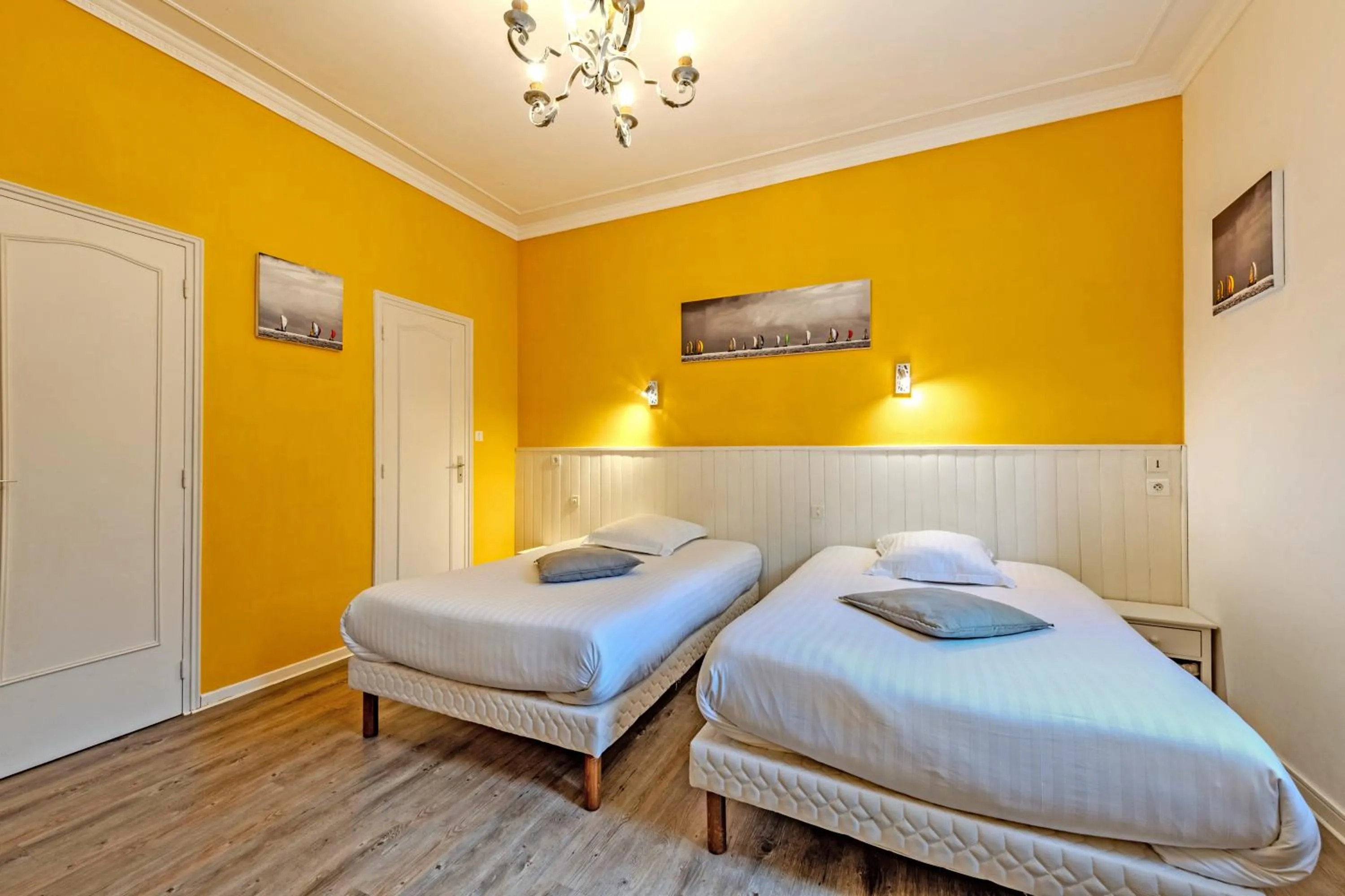 Bed in Logis Hotel De La Corniche