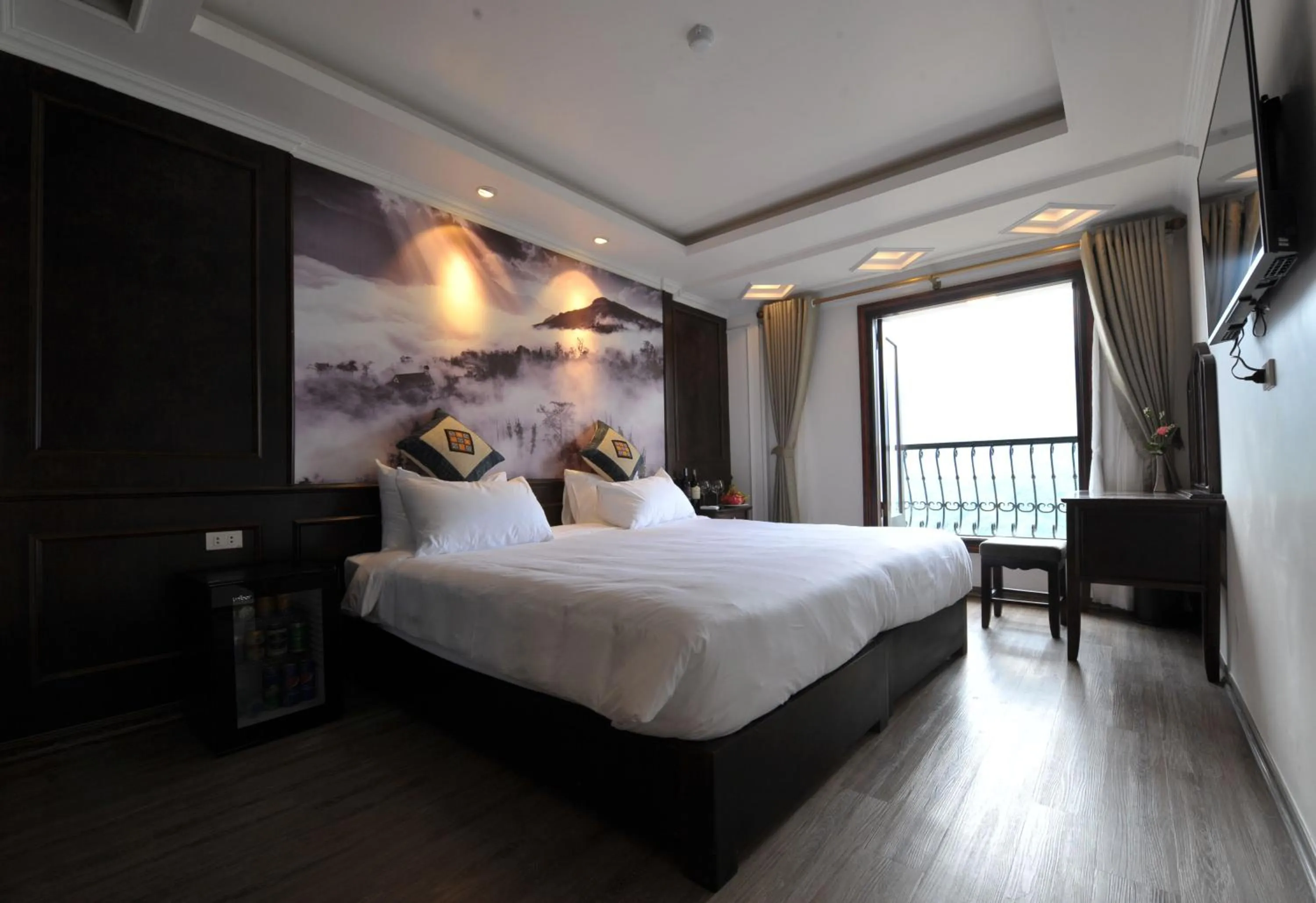 Photo of the whole room, Bed in Delta Sapa Hotel - Old Quarter Center