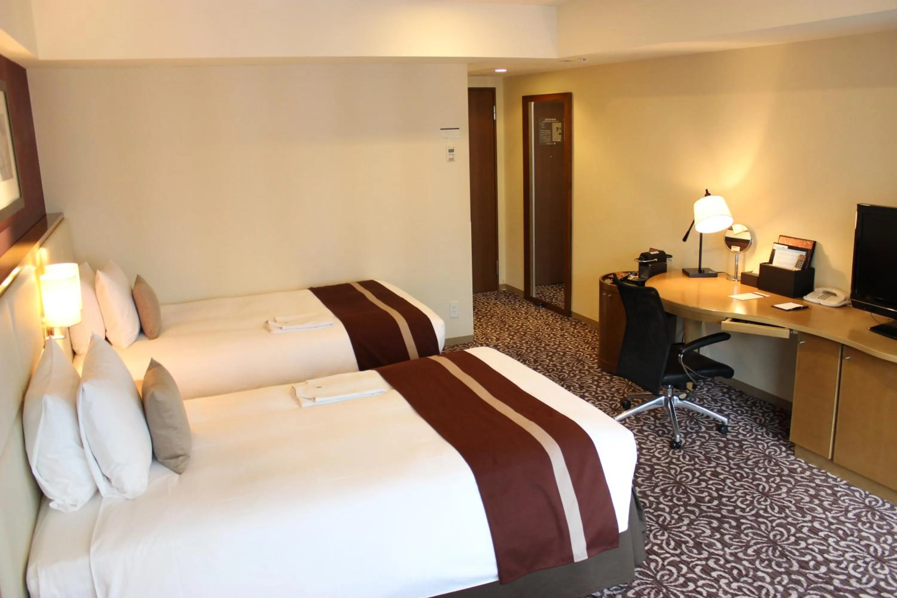 Bed in Hotel Ryumeikan Tokyo