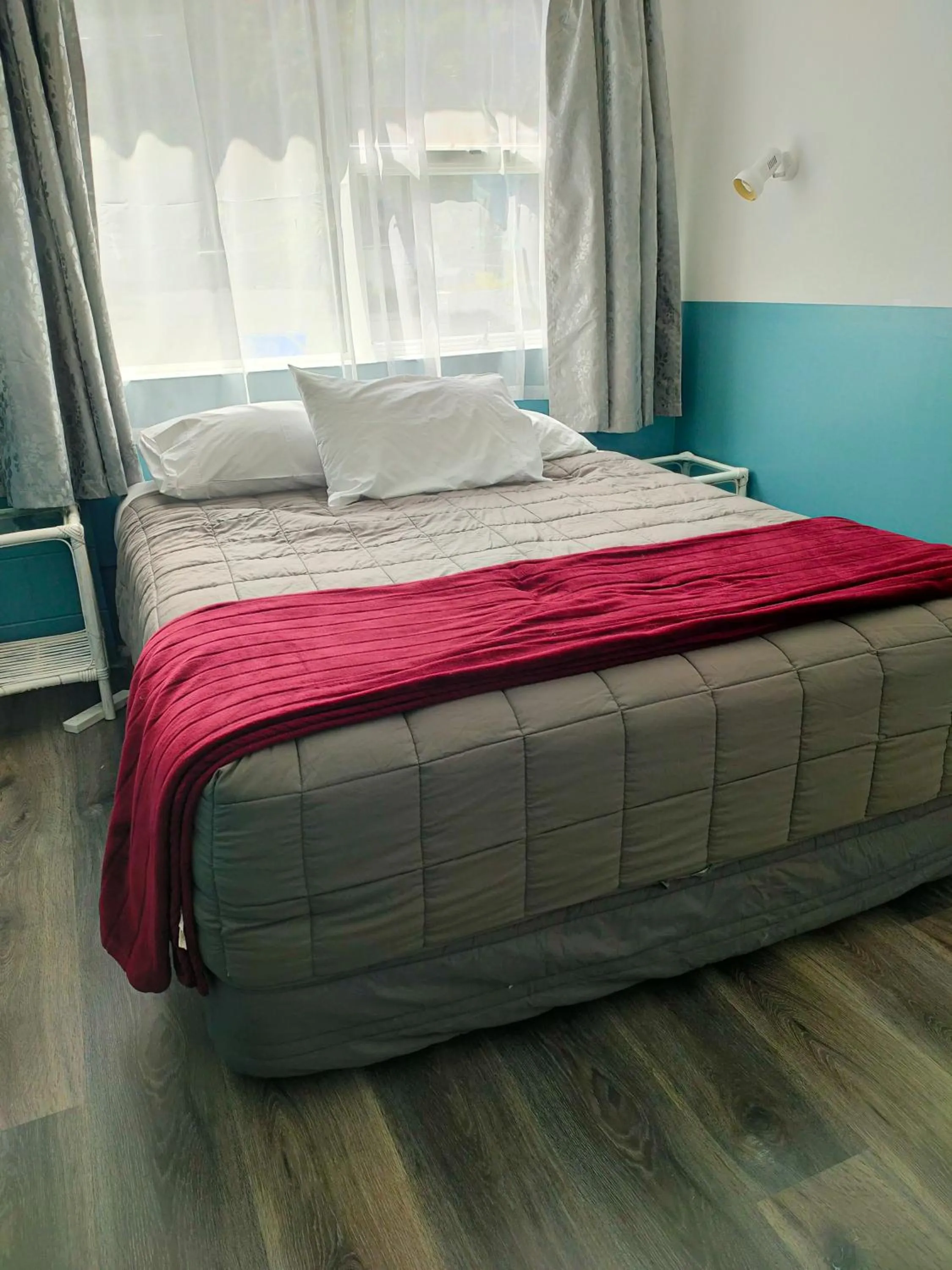 Bed in Aarangi Tui Motel