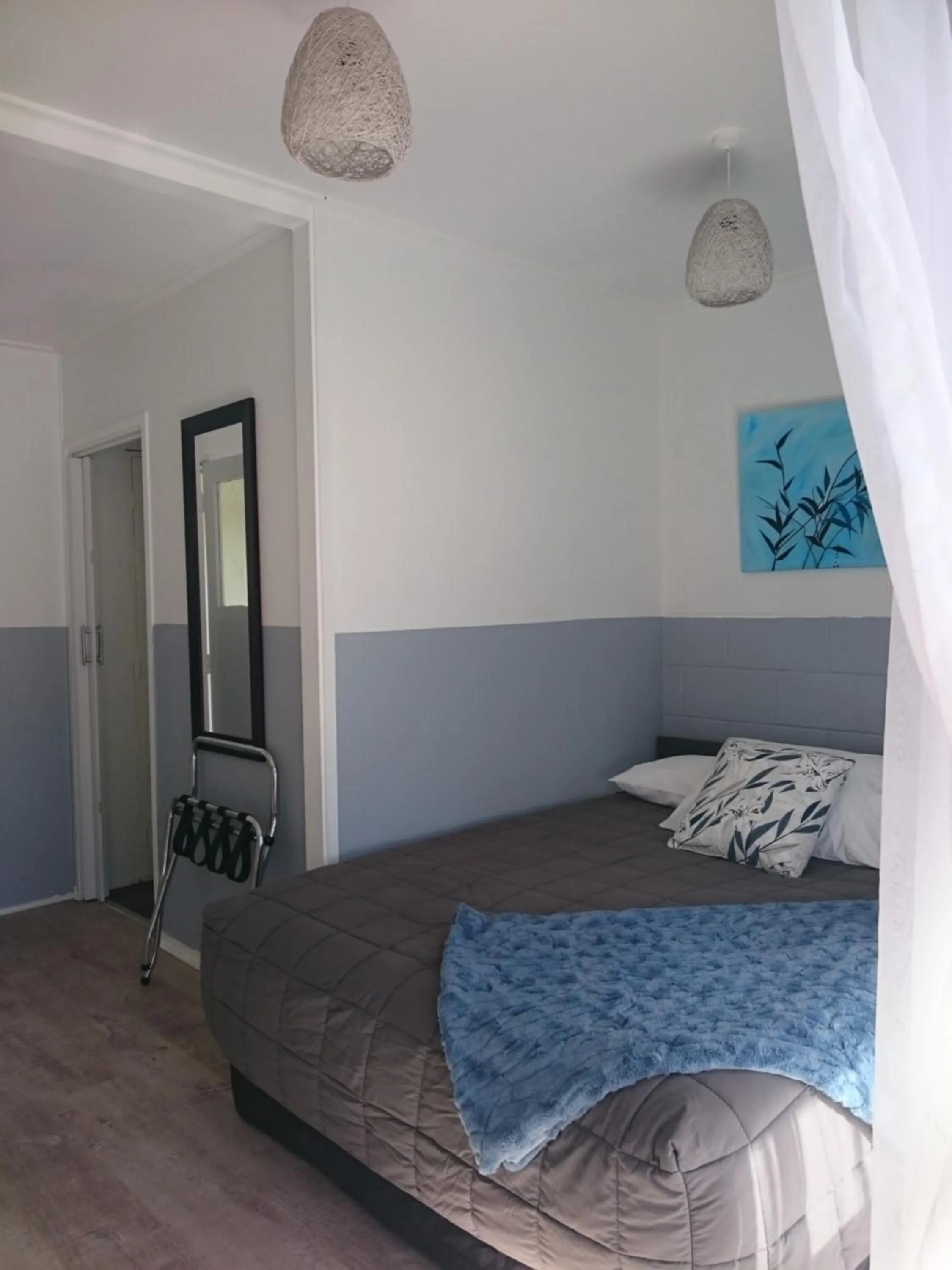 Bed in Aarangi Tui Motel