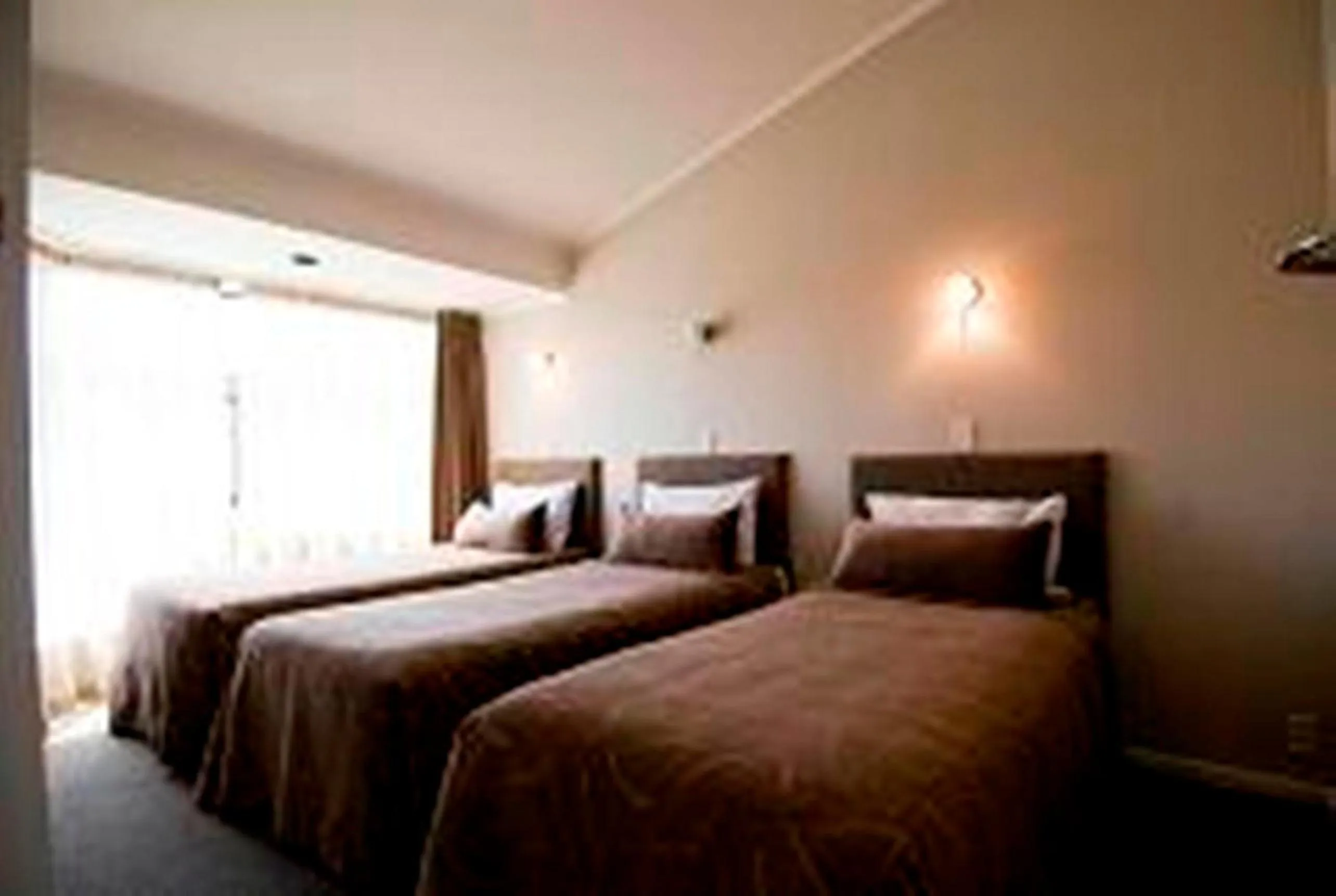 Bedroom, Bed in Marineland Beachfront Accommodation