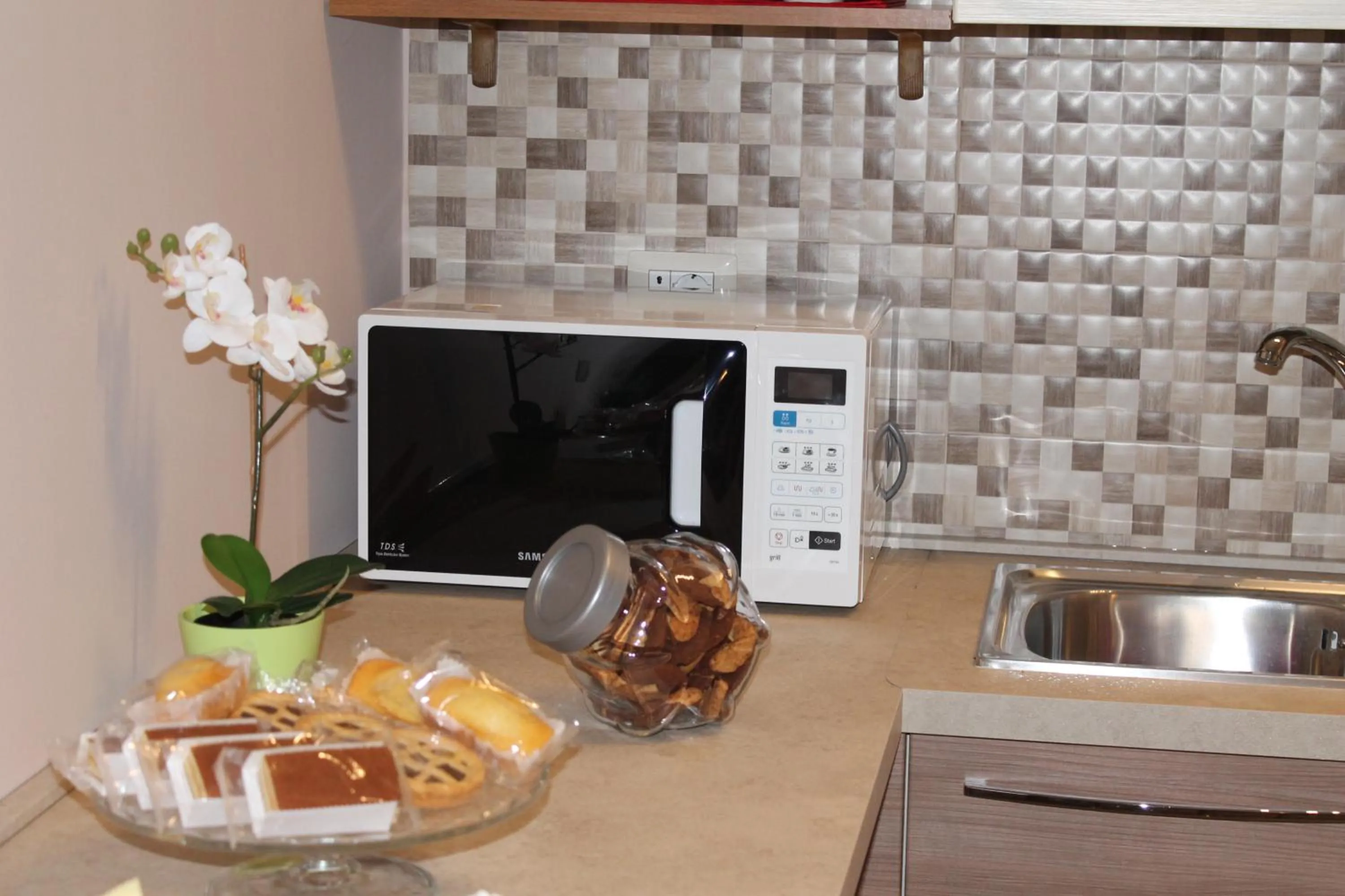 Kitchen or kitchenette in B&B Around the World