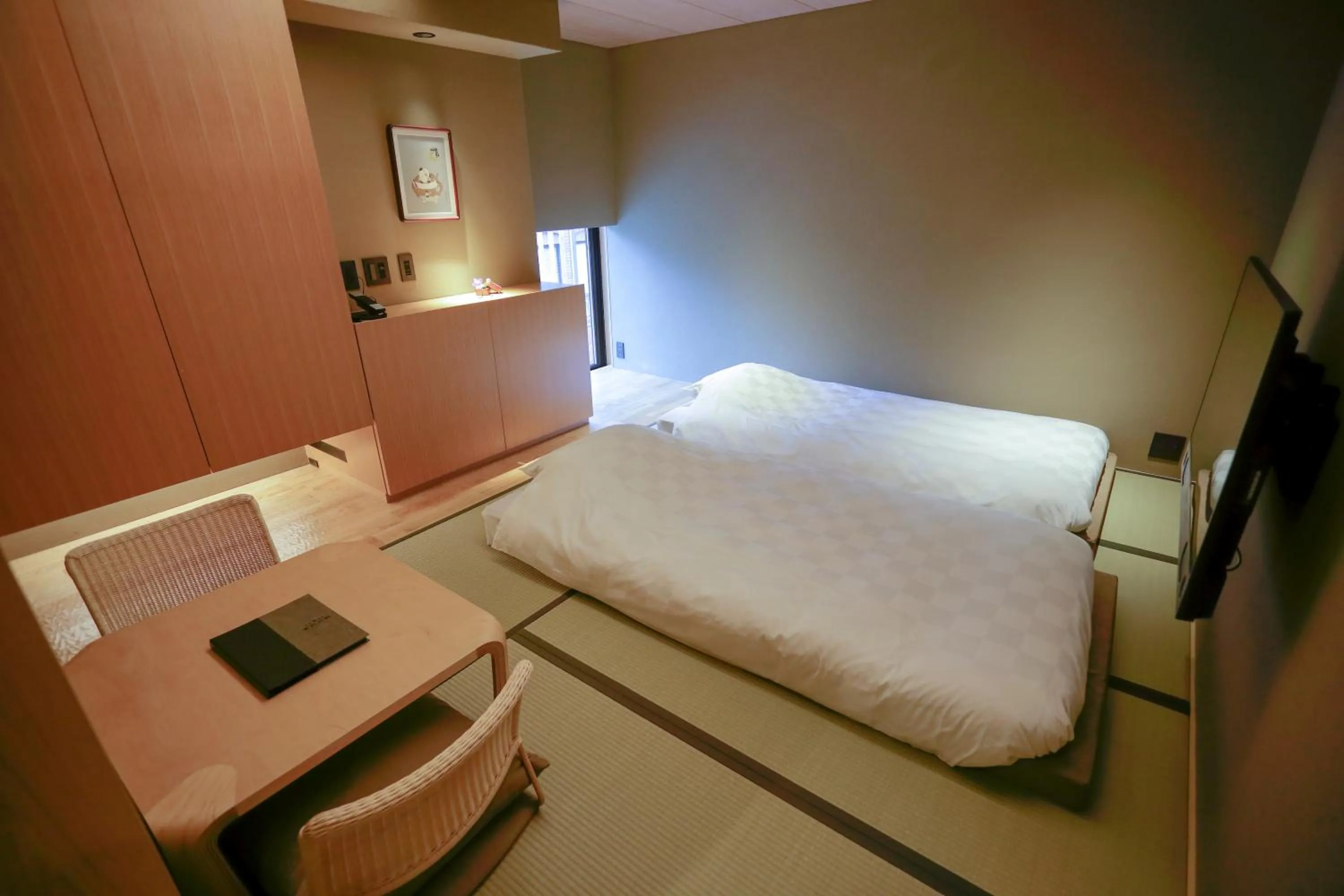 Bed in Kaminarimon Ryokan