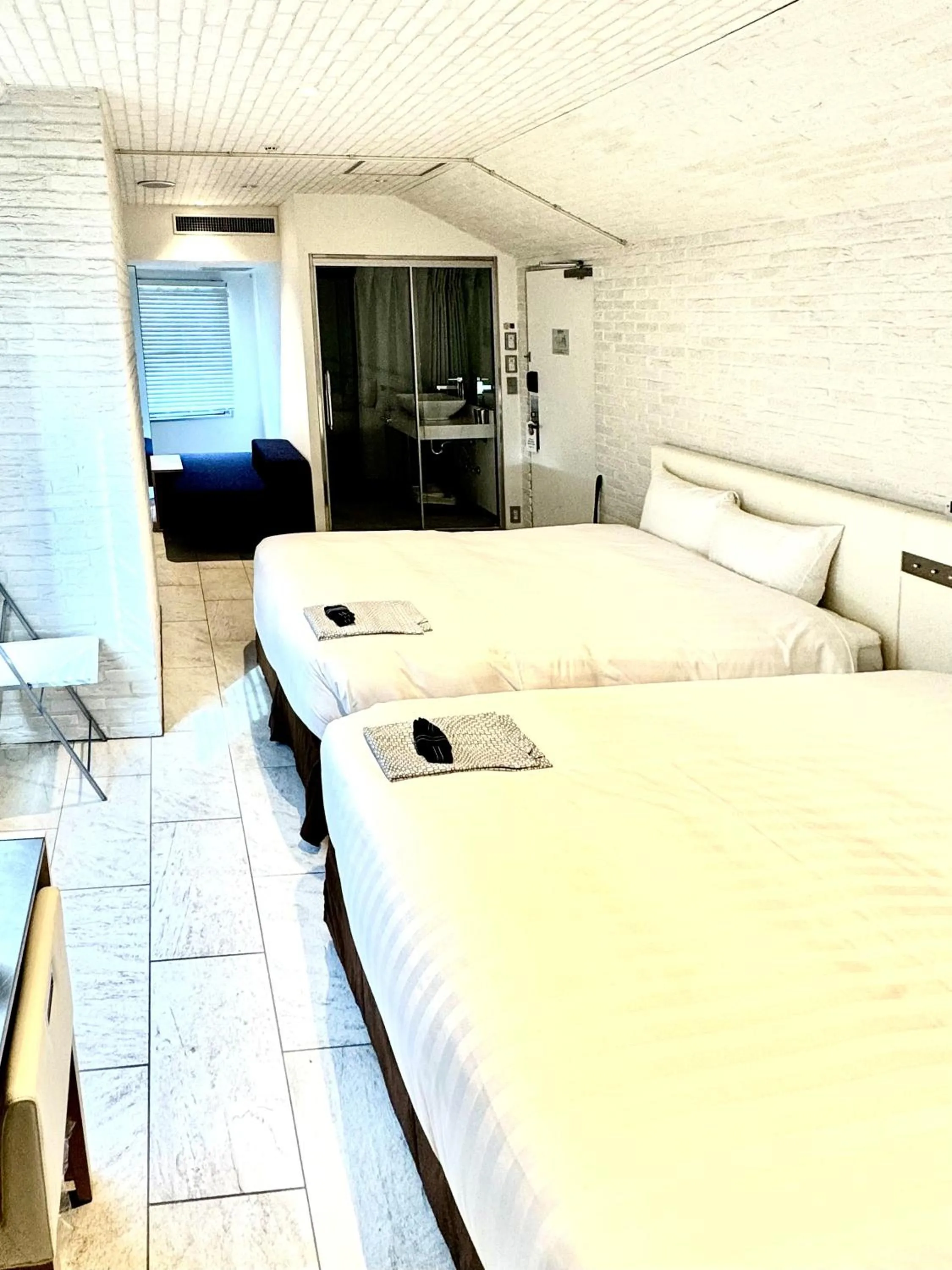 Photo of the whole room, Bed in EN Hotel Shibuya