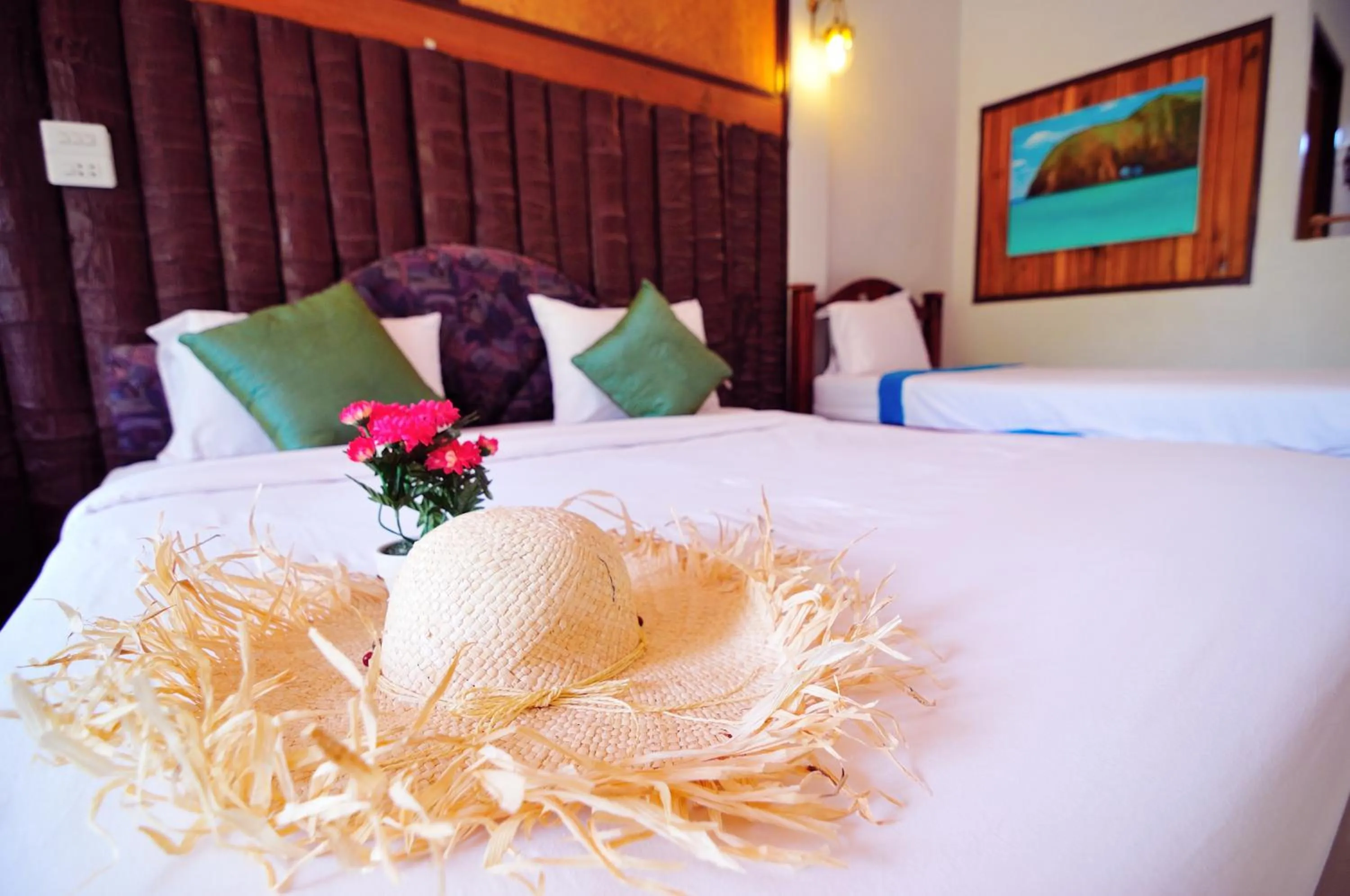 Bed in Koh Talu Island Resort