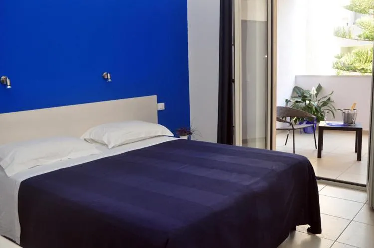 Day, Bed in Hotel La Punta