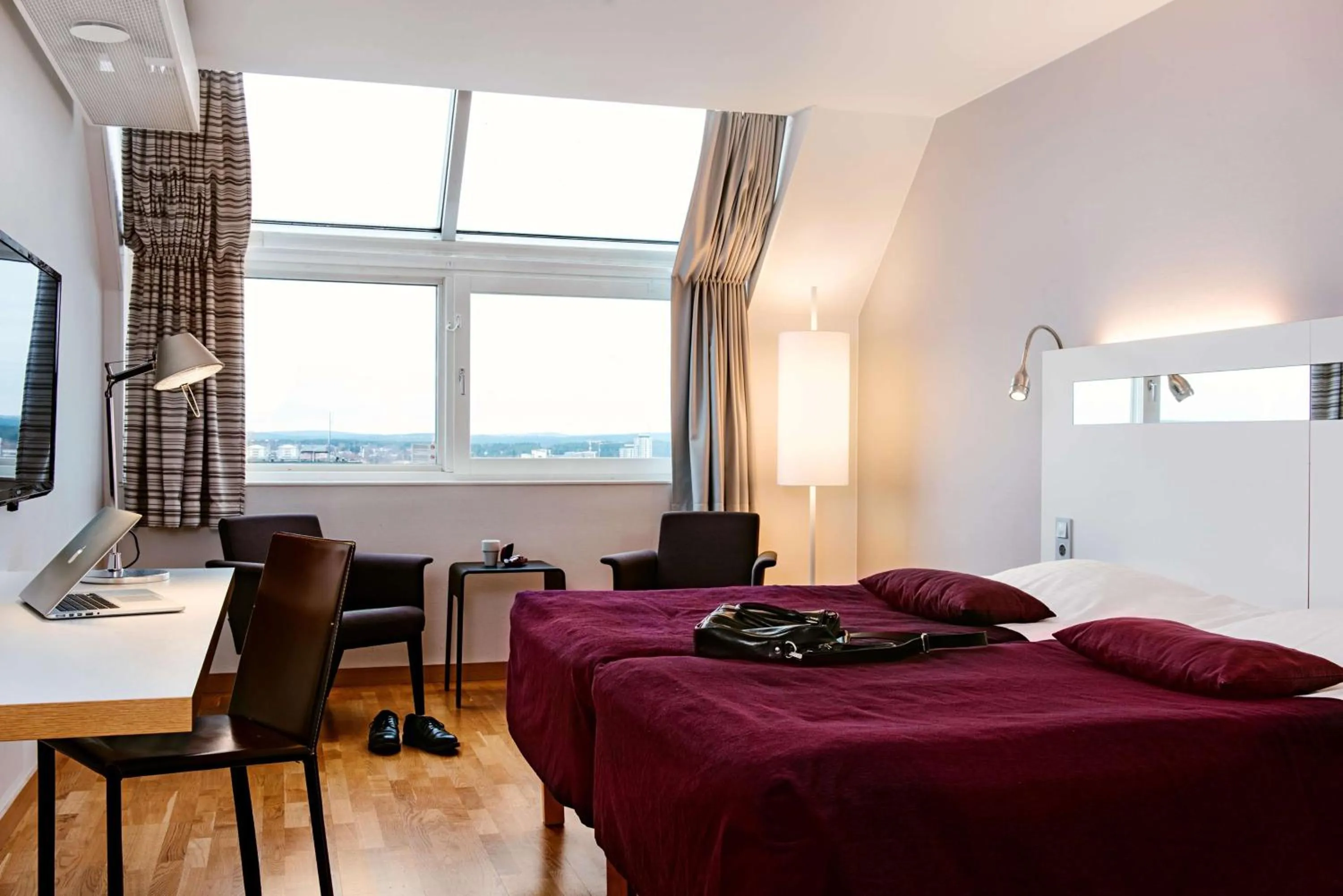 Photo of the whole room, Bed in Scandic Plaza Umeå