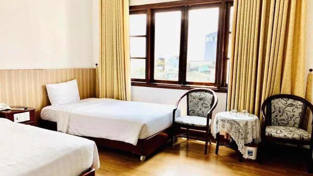 Bed in Cosiana Hue Hotel