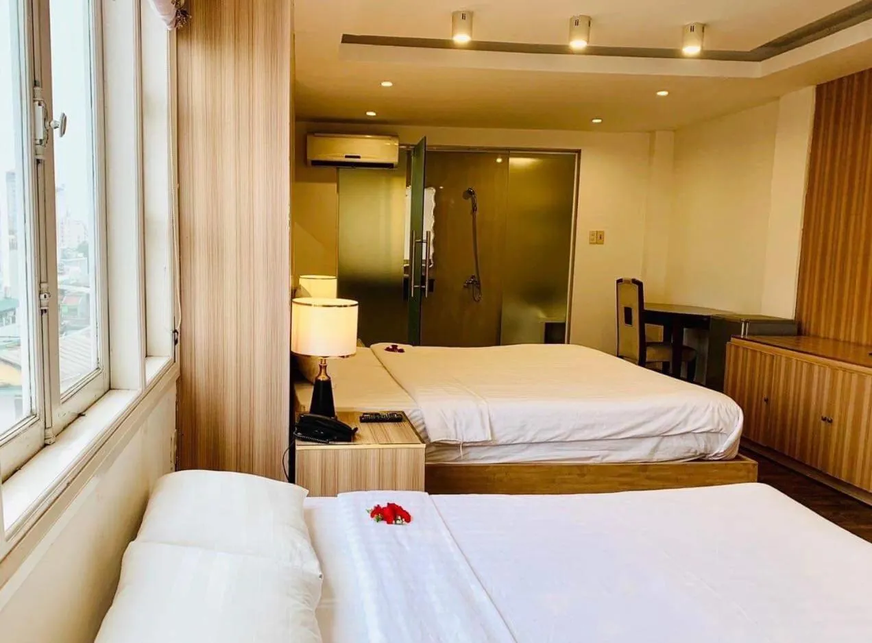 Bed in Cosiana Hue Hotel