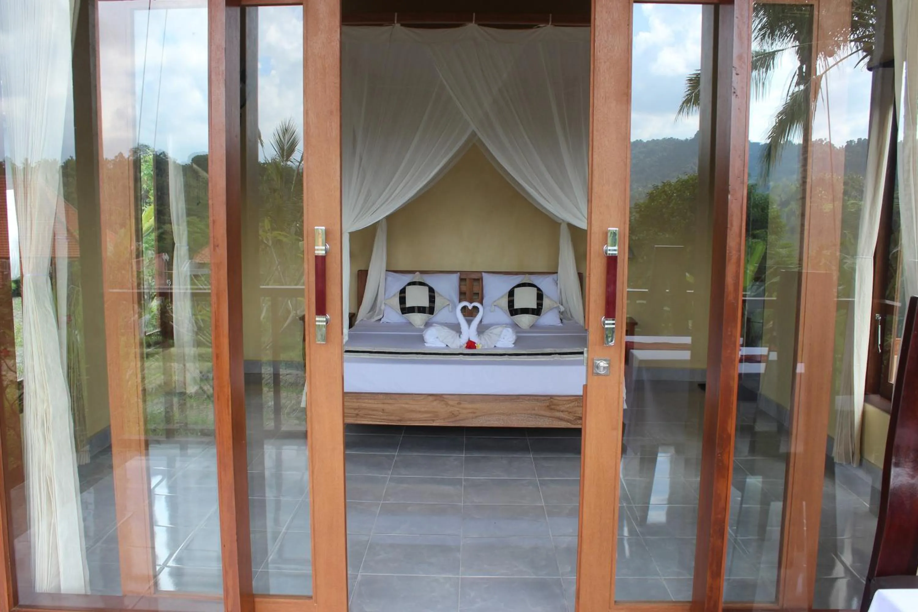 Bed in Maha Neka Villa