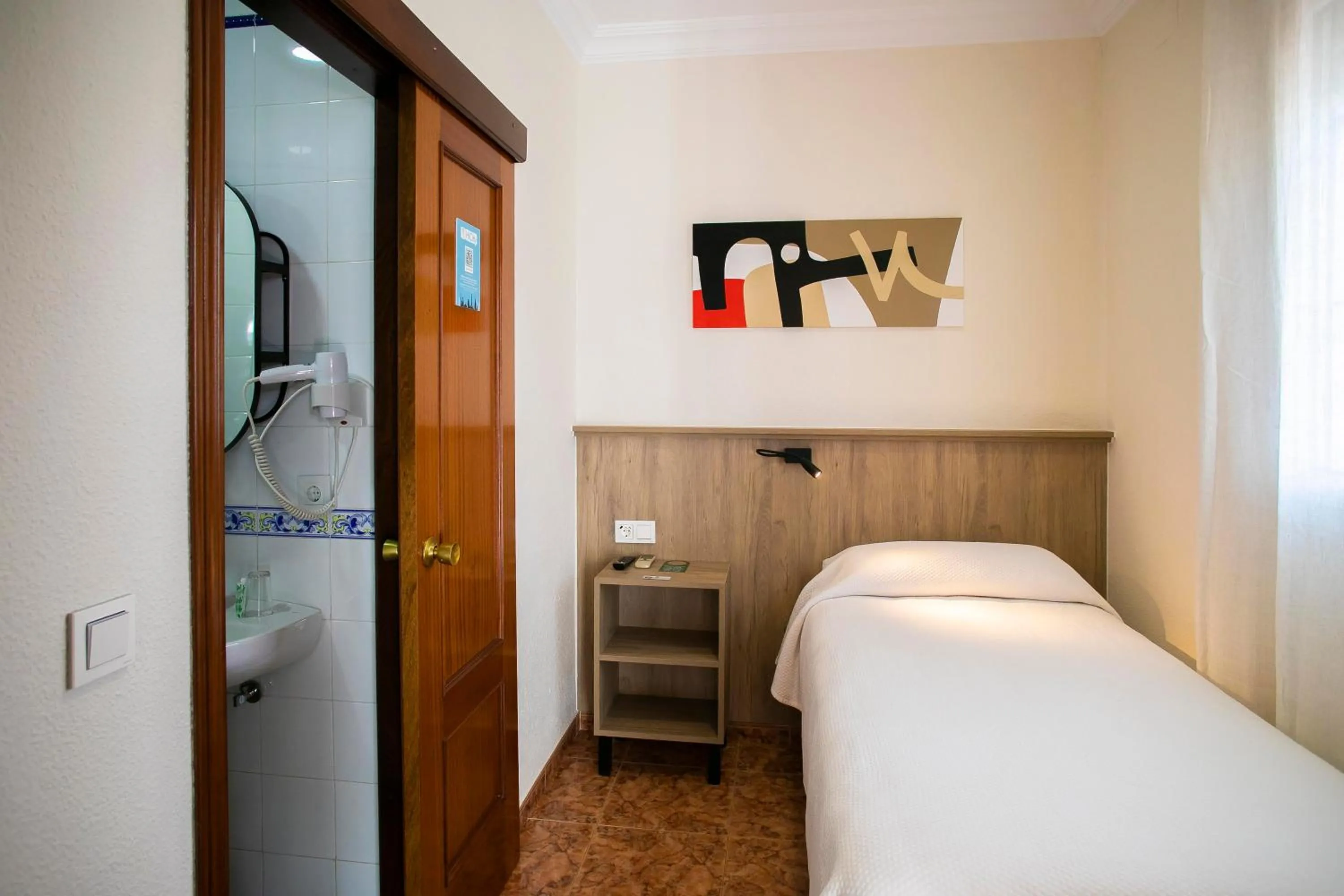 Bed in Pensión Dulces Sueños