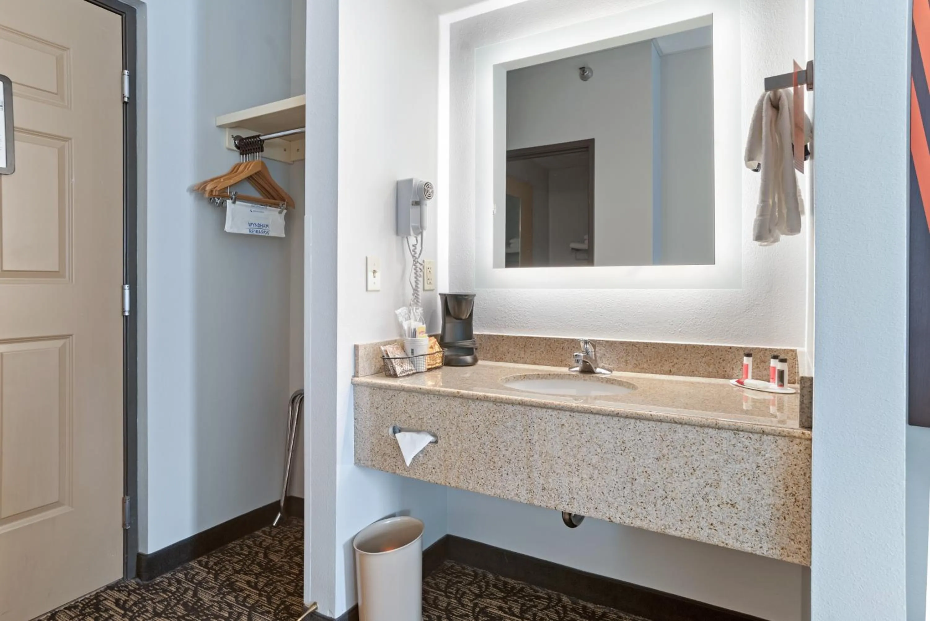 Bathroom in Elevation Inn & Suites, Trademark Collection by Wyndham